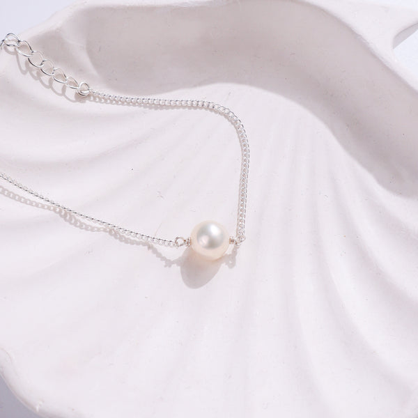 Sterling silver bracelet with pearl accent