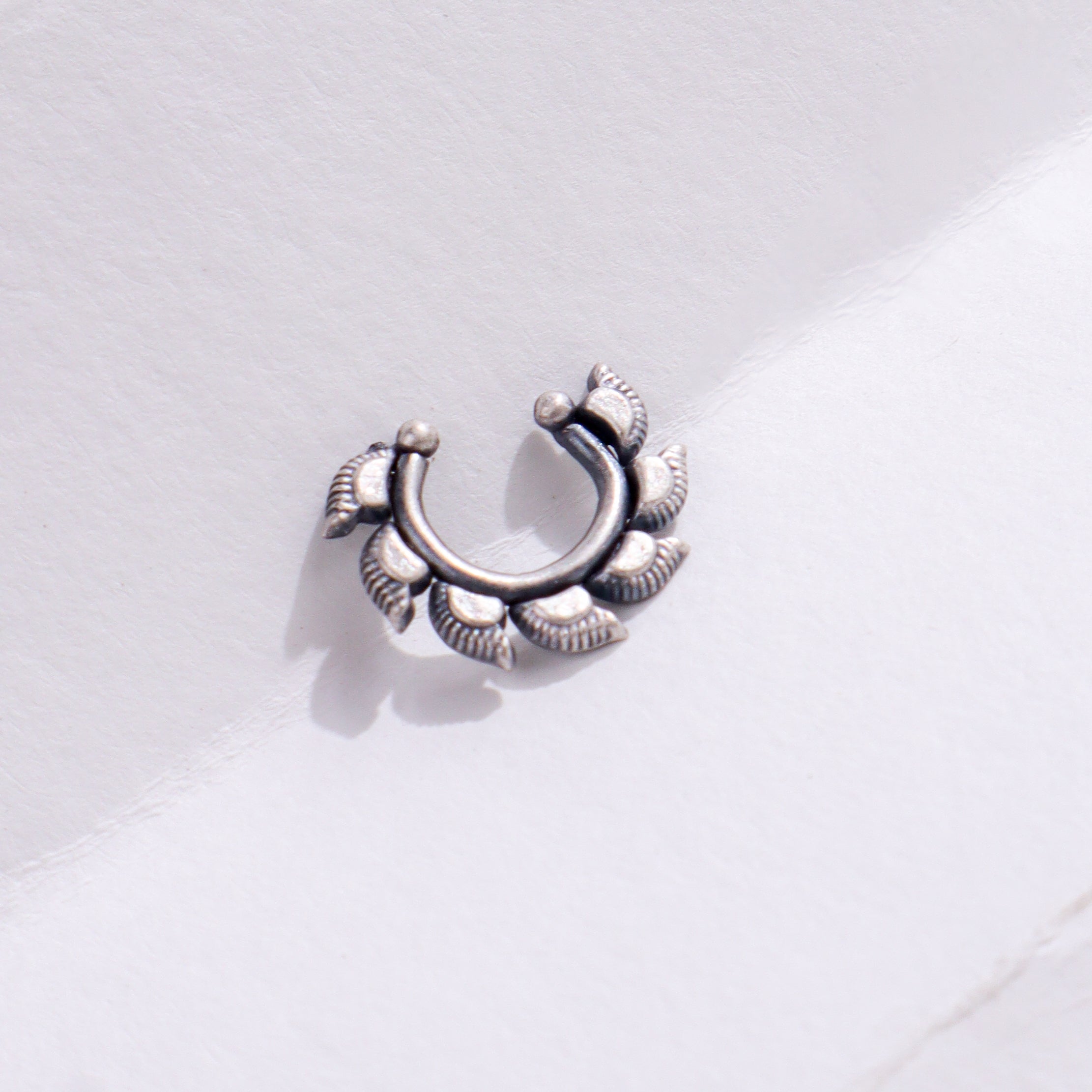 Silver floral jewelry piece for women