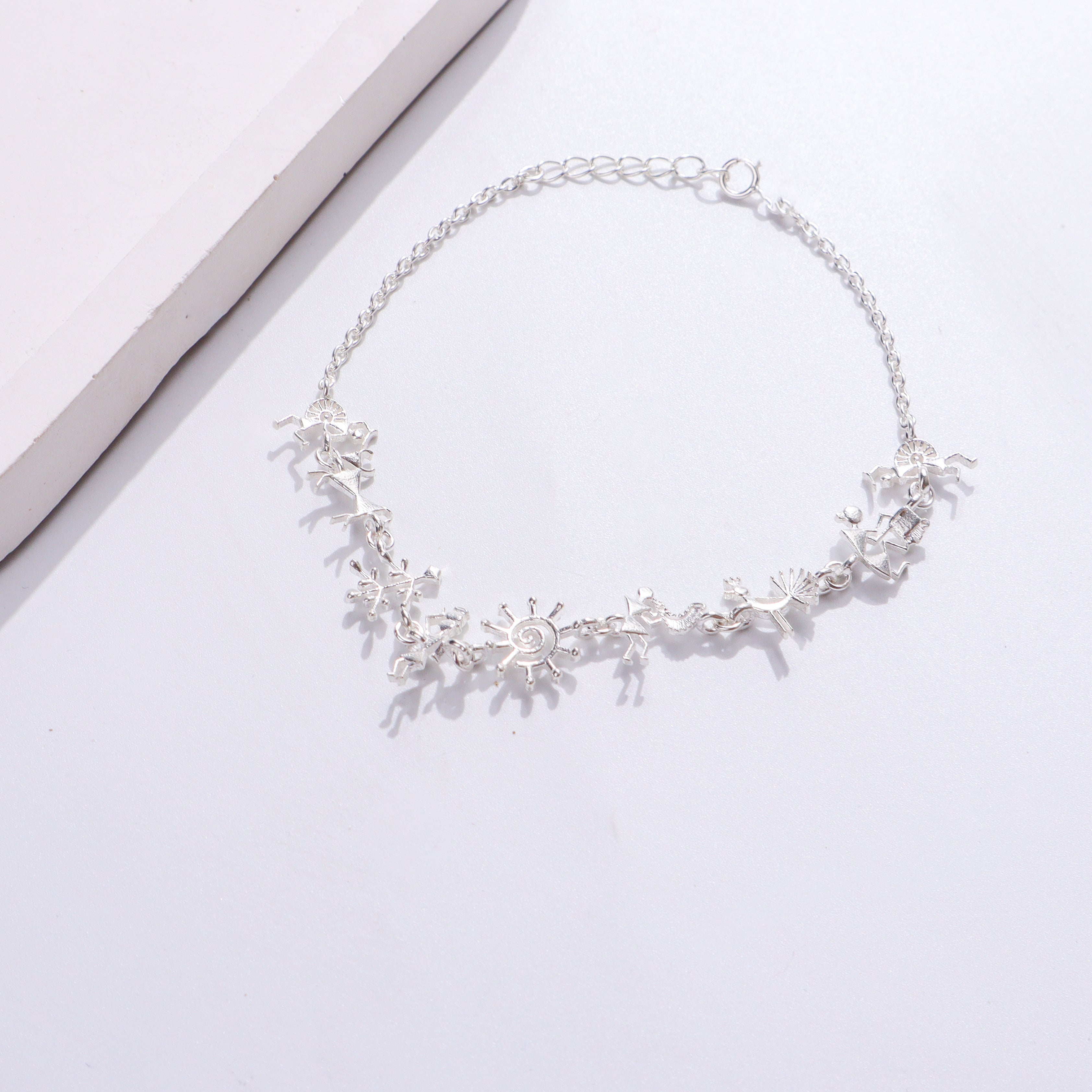 Silver bracelet with snowflake charms