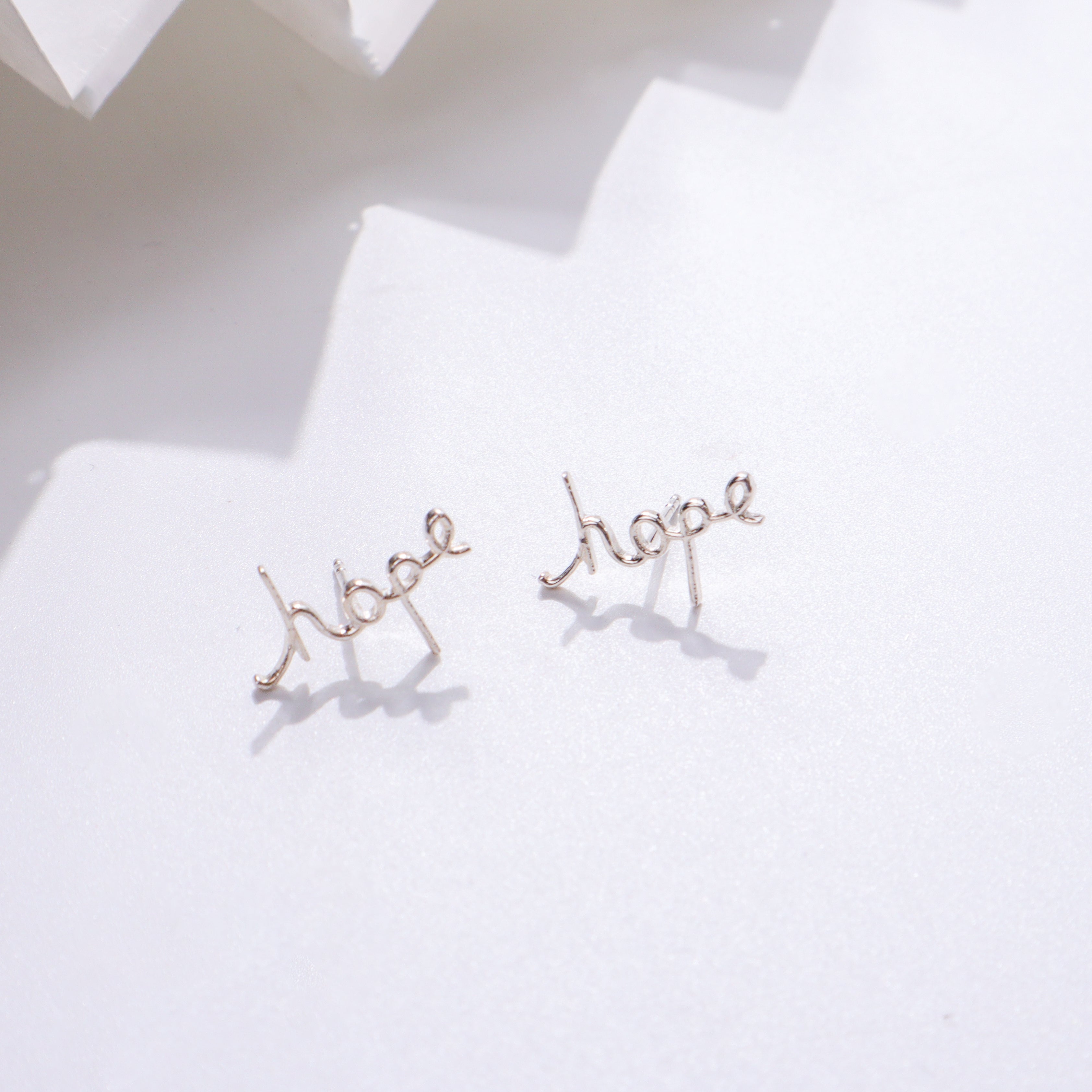 Hope Earrings in sterling silver with inspirational design