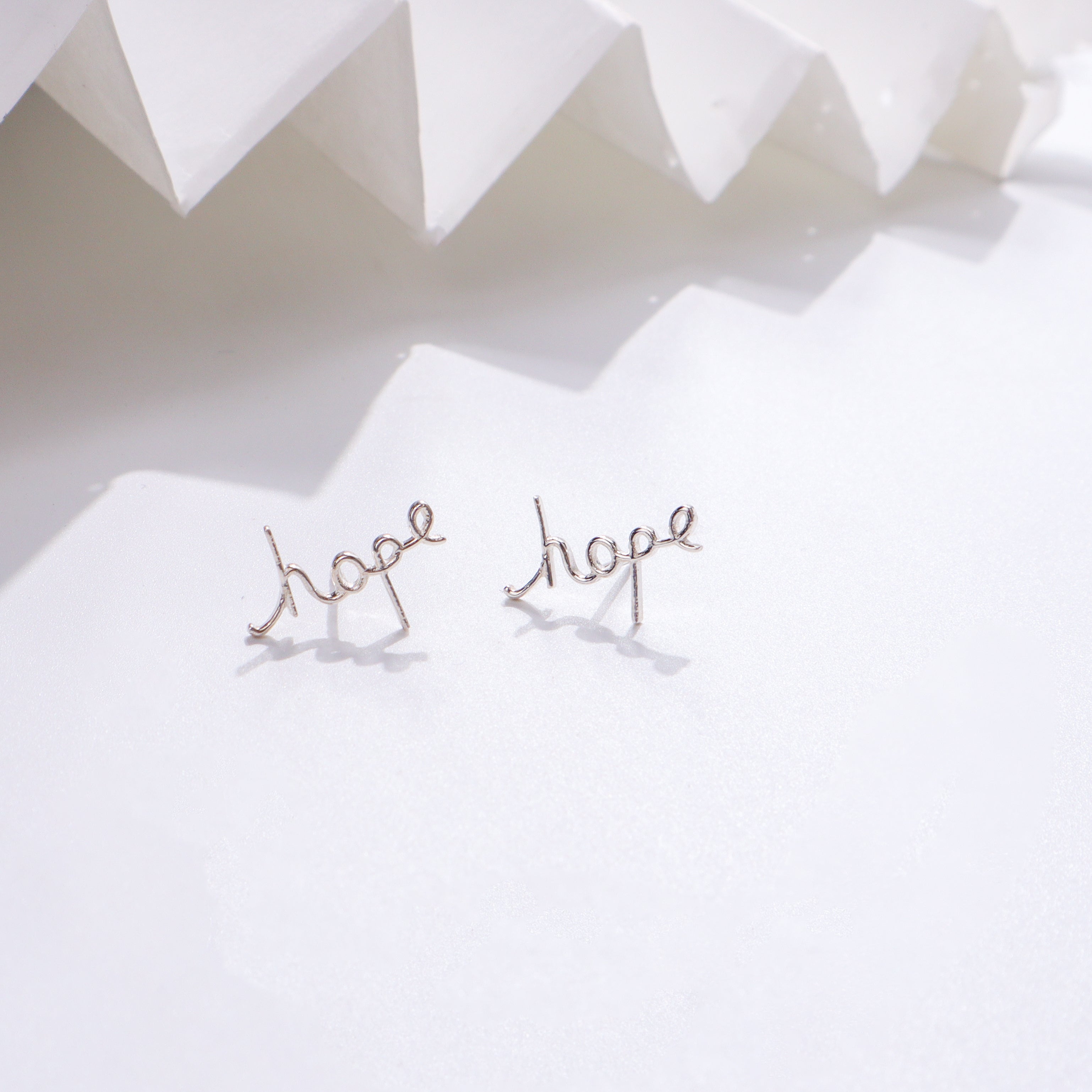 Hope Earrings in sterling silver with inspirational design