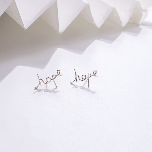 Hope Earrings in sterling silver with inspirational design