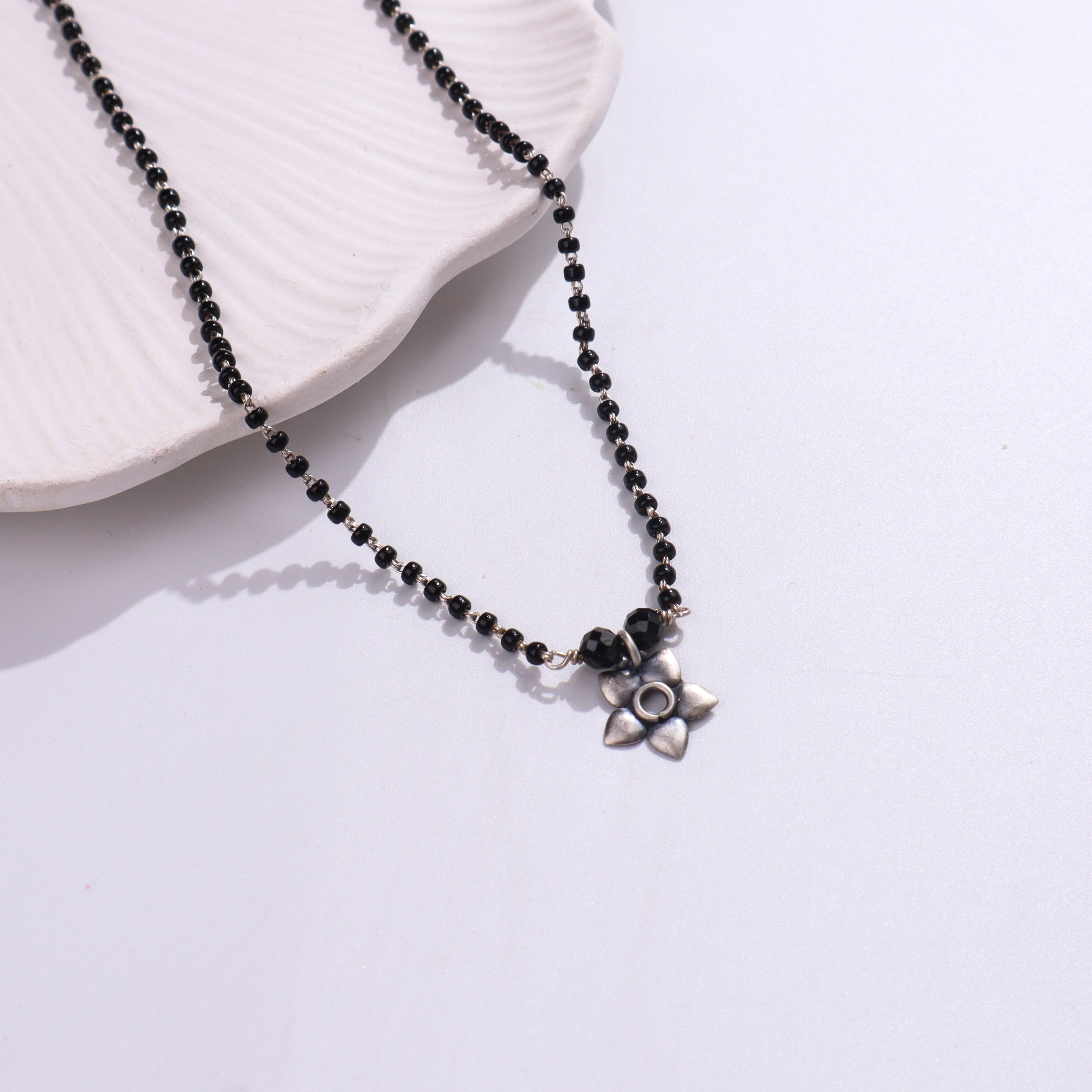 Black beaded silver mangalsutra with heart pendant