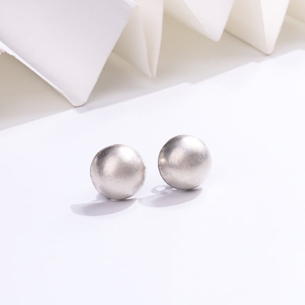 Silver stud earrings with matte finish