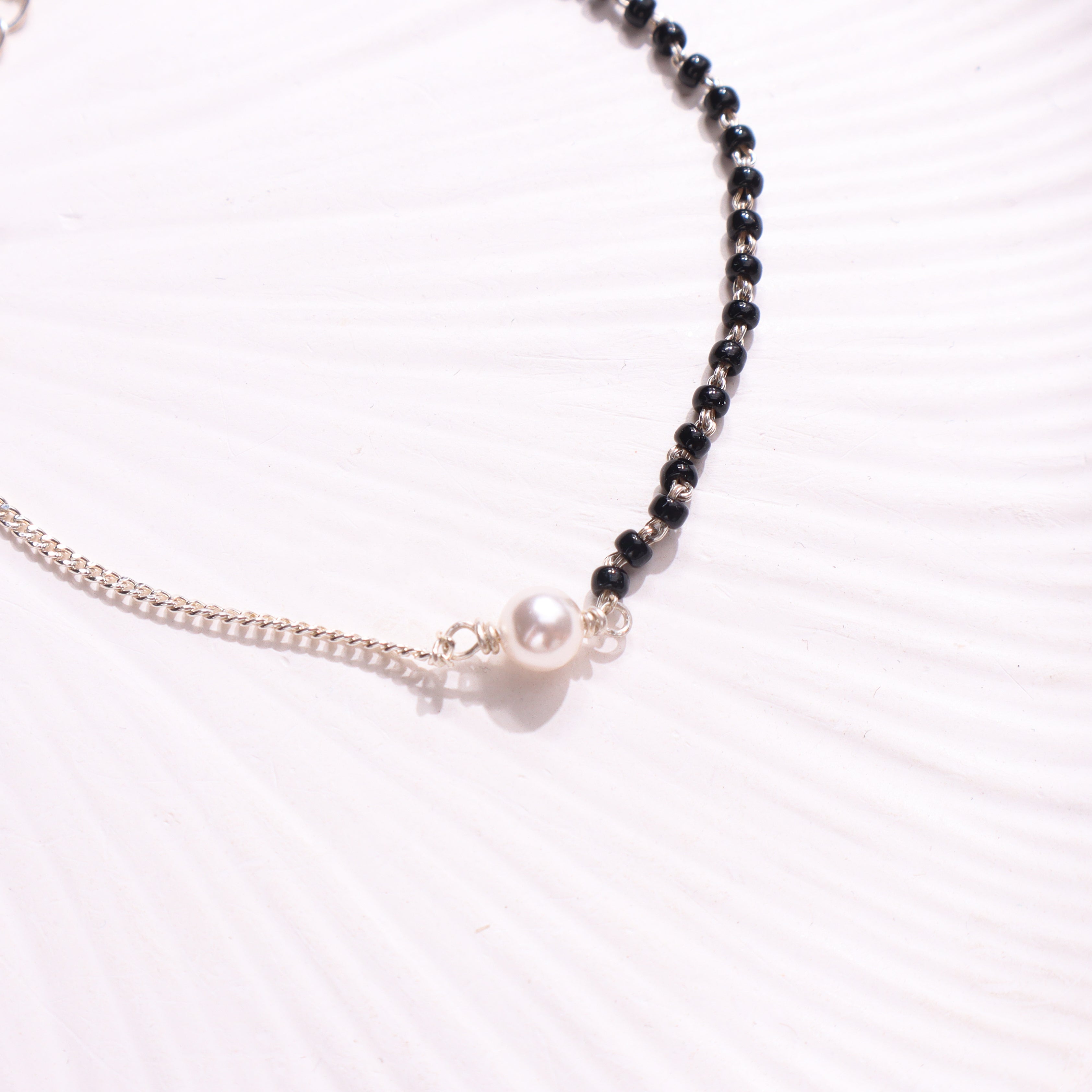 Silver pearl mangalsutra necklace with black beads and chain