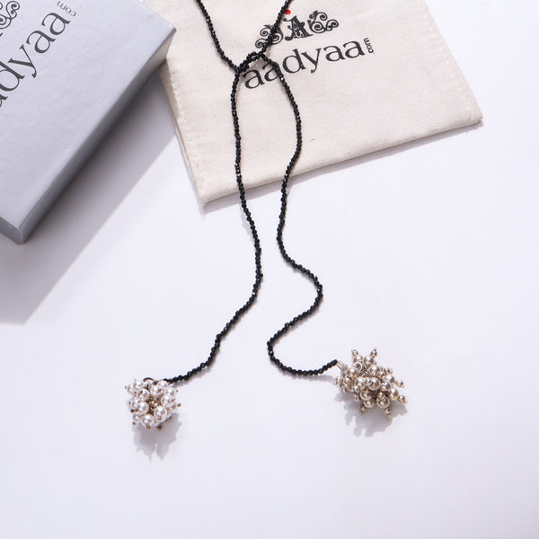 Black beaded mangalsutra with pearl pendant from House of Aadyaa