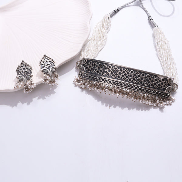 Sterling silver pearl choker set with intricate silver jewelry design