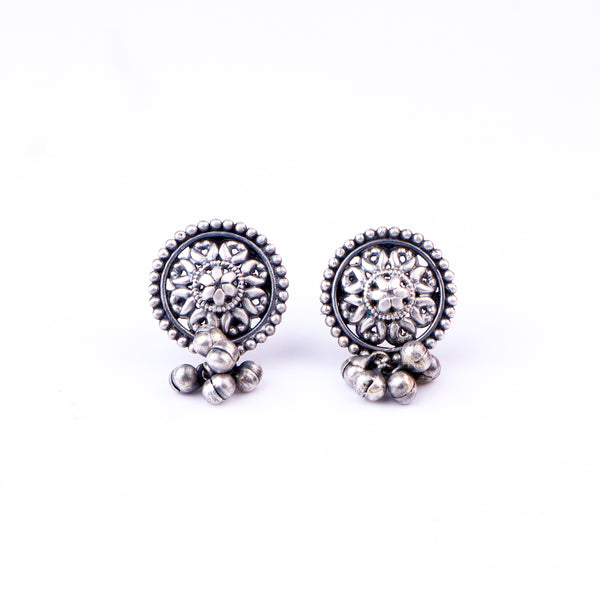Silver earrings with floral motifs and intricate design