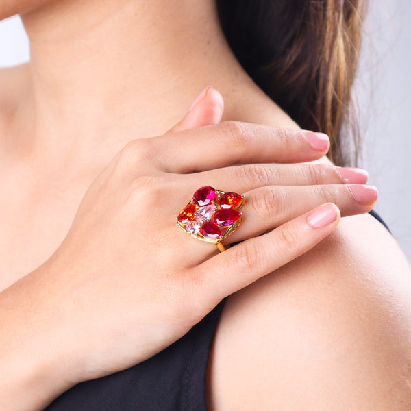 Woman wearing vibrant gemstone statement ring