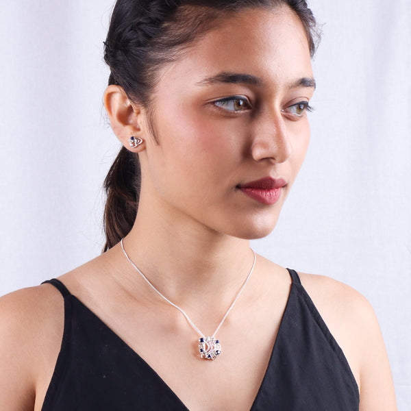 Silver Vivid Bloom necklace with matching earrings, crescent motif, blue CZ stones, sterling silver