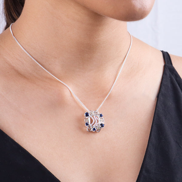 Silver Vivid Bloom necklace and earrings worn by model
