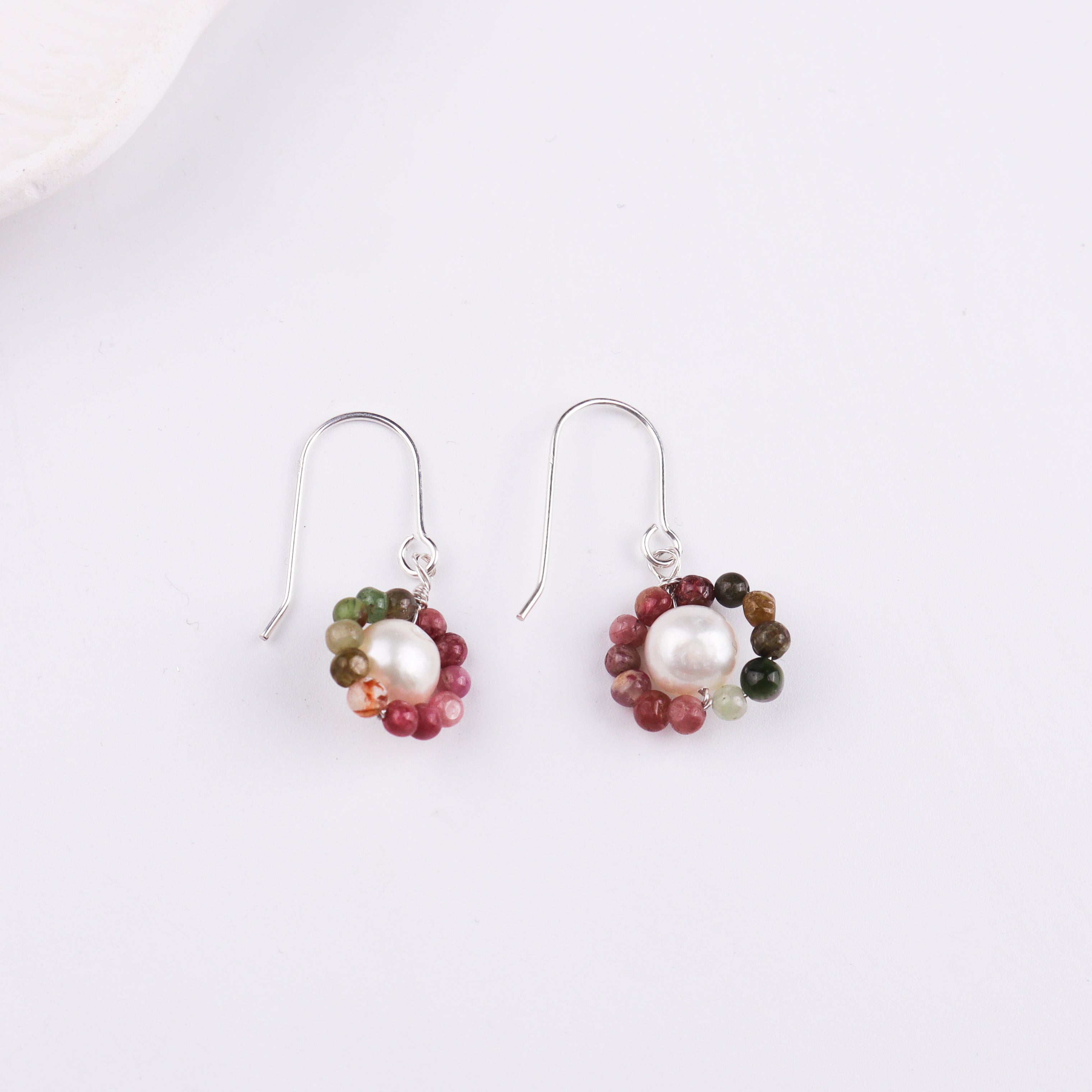 Silver hook earring with pearl and beads