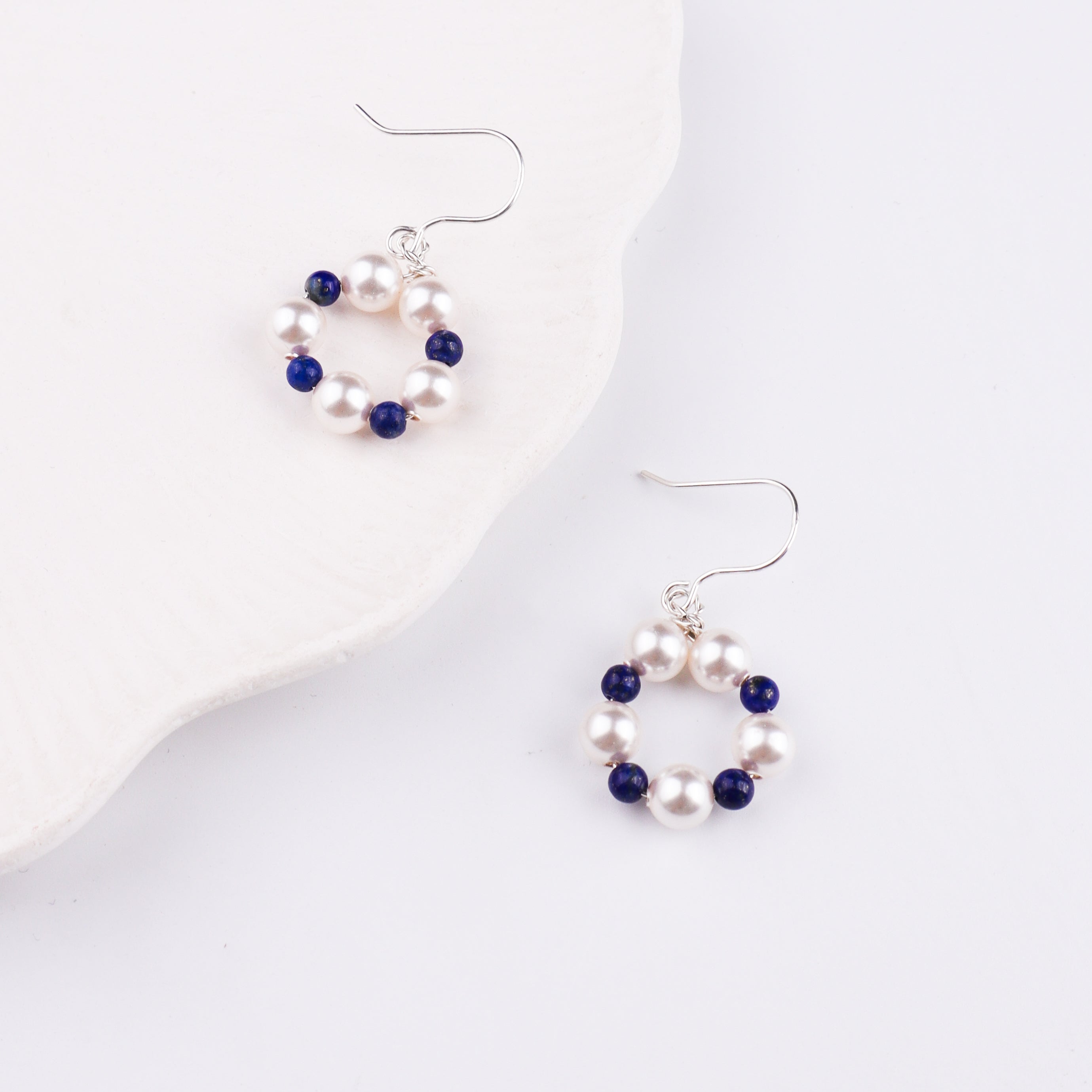 Silver hook earrings with pearl and lapis lazuli beads