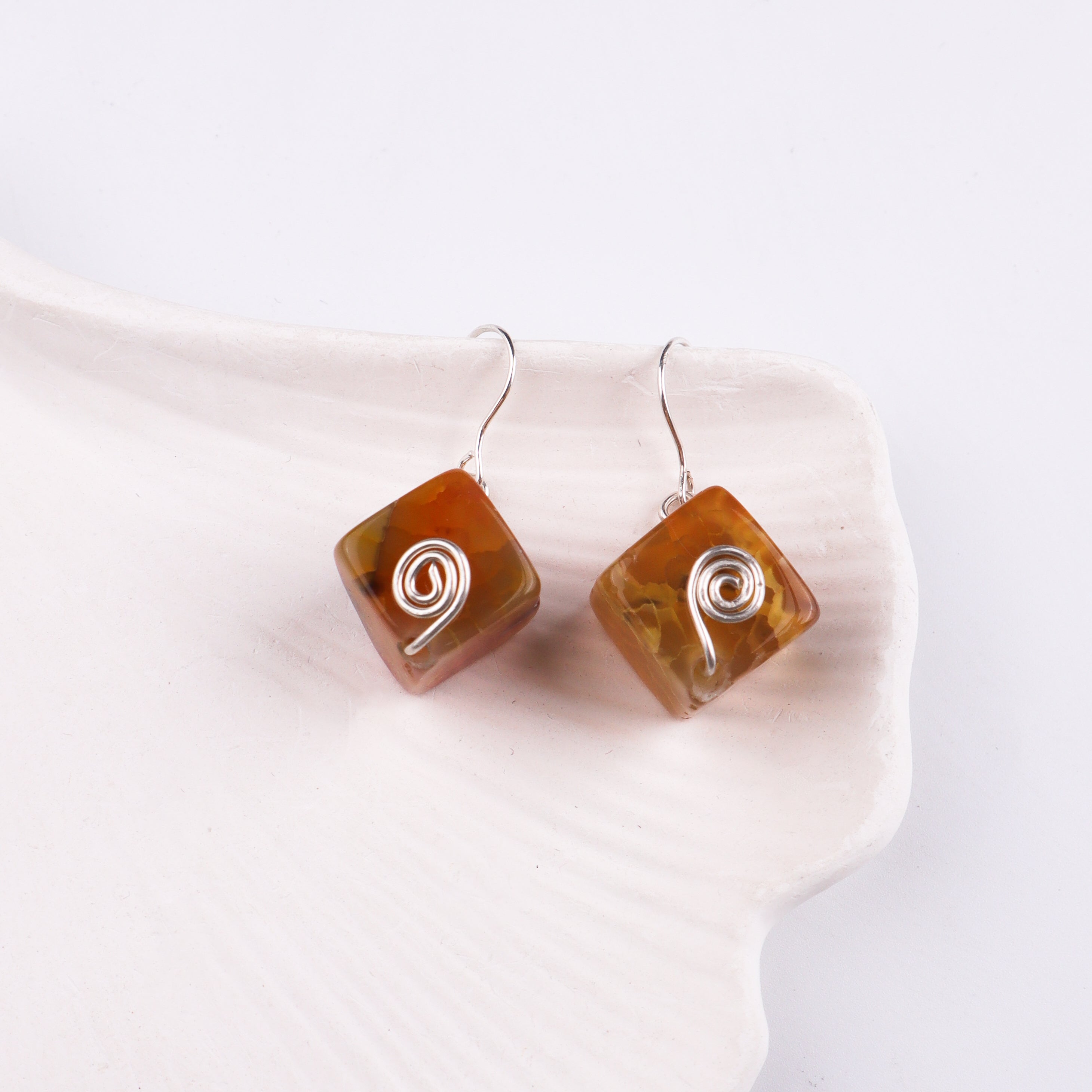 Agate stone jewelry on white background