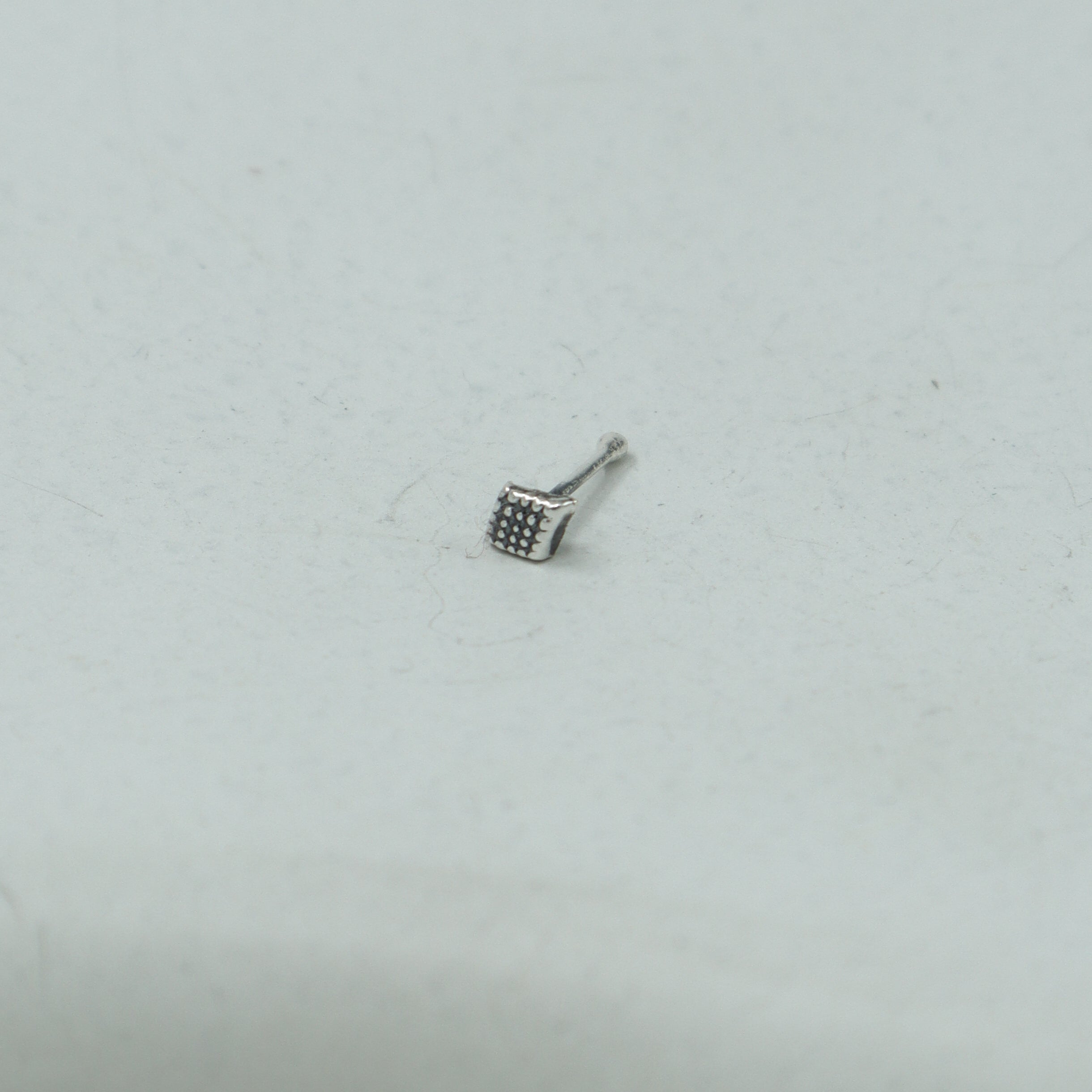 Silver Dotted Diamond Nose pin