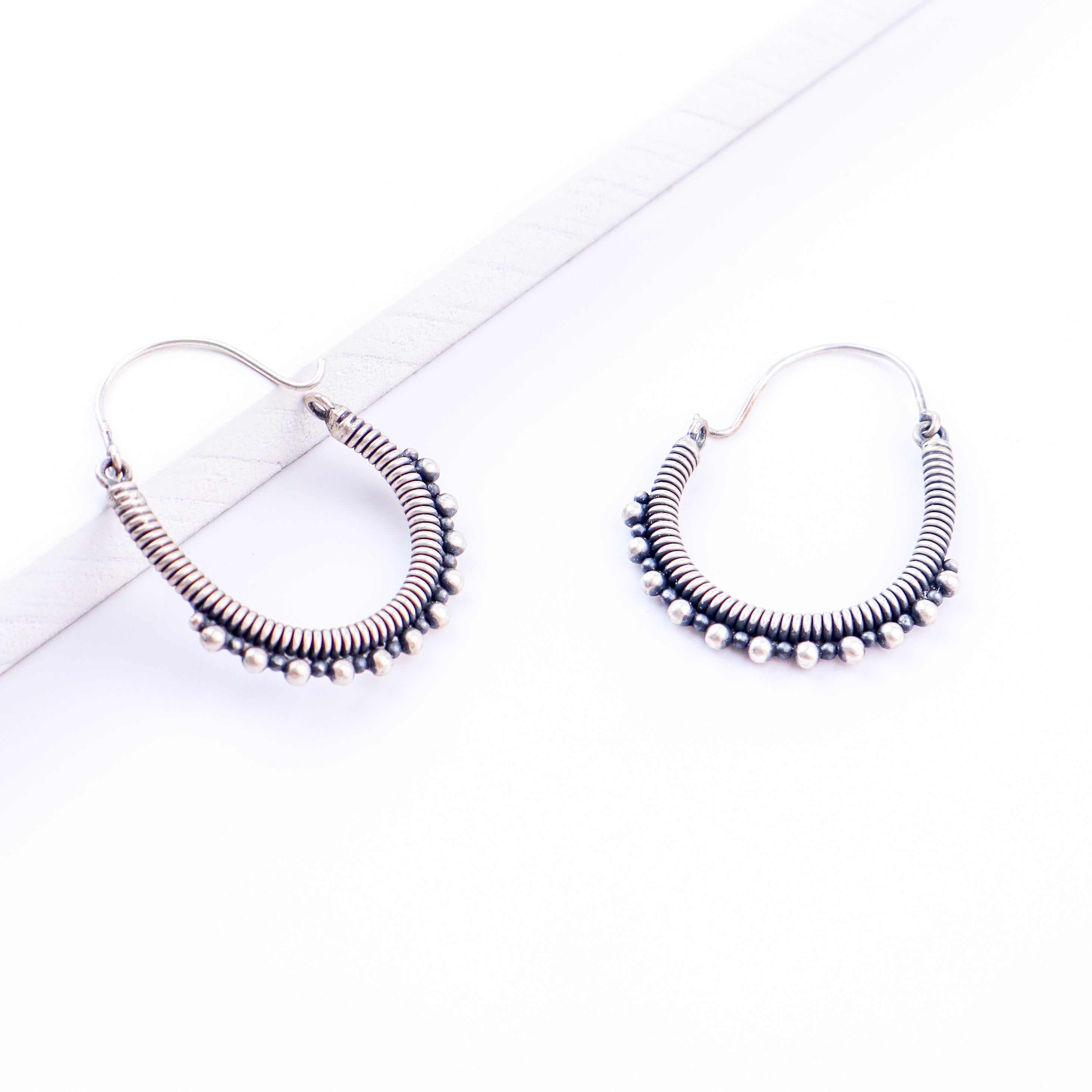 Oxidized spring hoops styled with saree and kurta