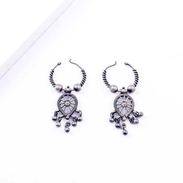 Detail shot highlighting textured oxidized silver finish