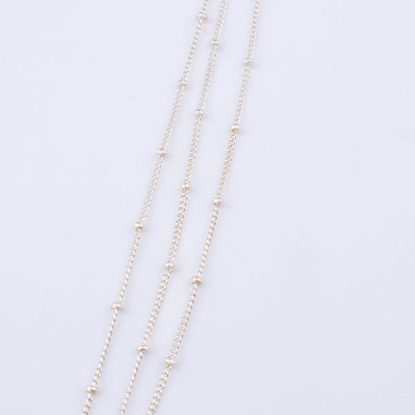 Silver layered necklace with small beads
