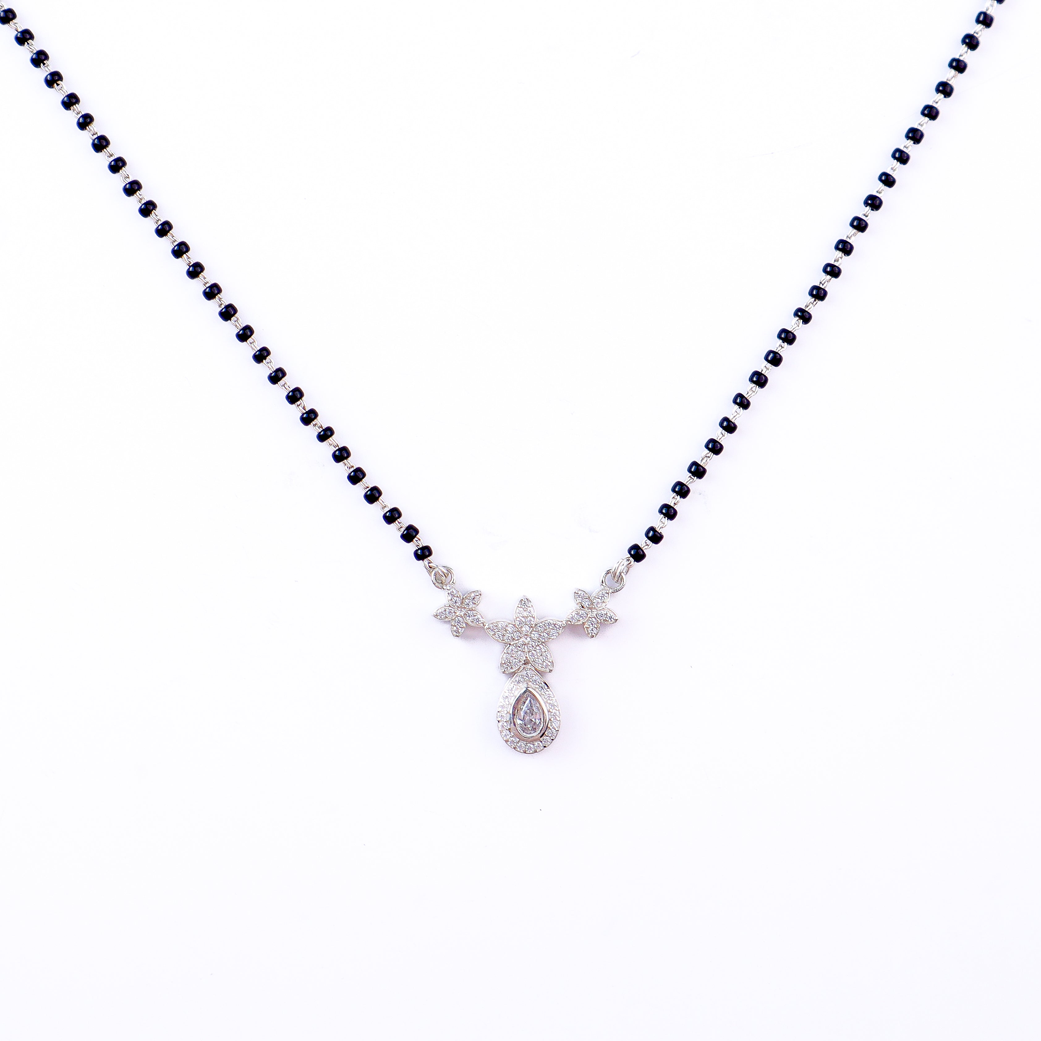 CZ flower drop mangalsutra styled with saree and modern outfit