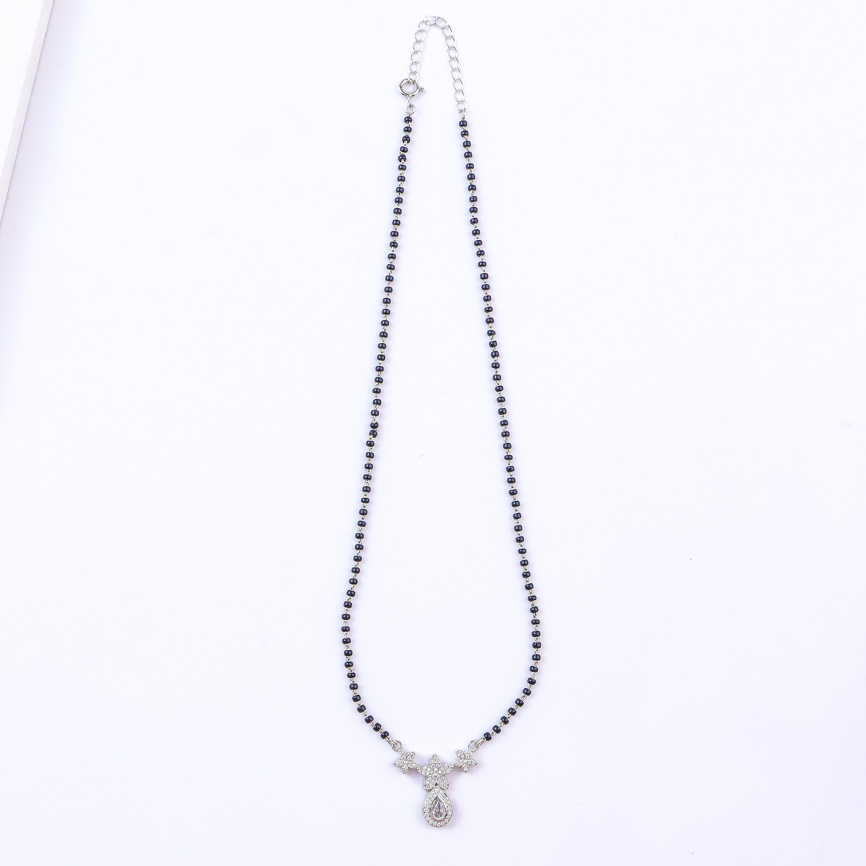CZ flower drop mangalsutra in 92.5 sterling silver