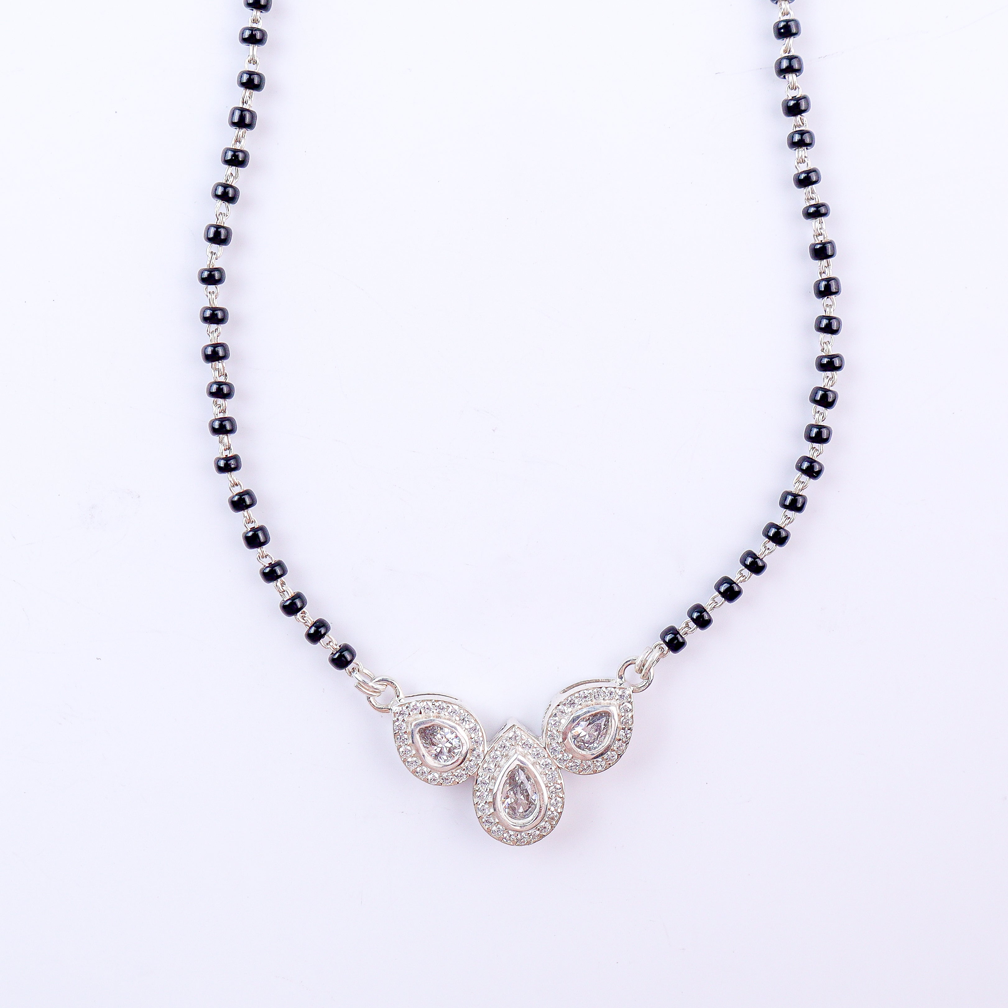 Detail shot highlighting CZ sparkle and silver craftsmanship