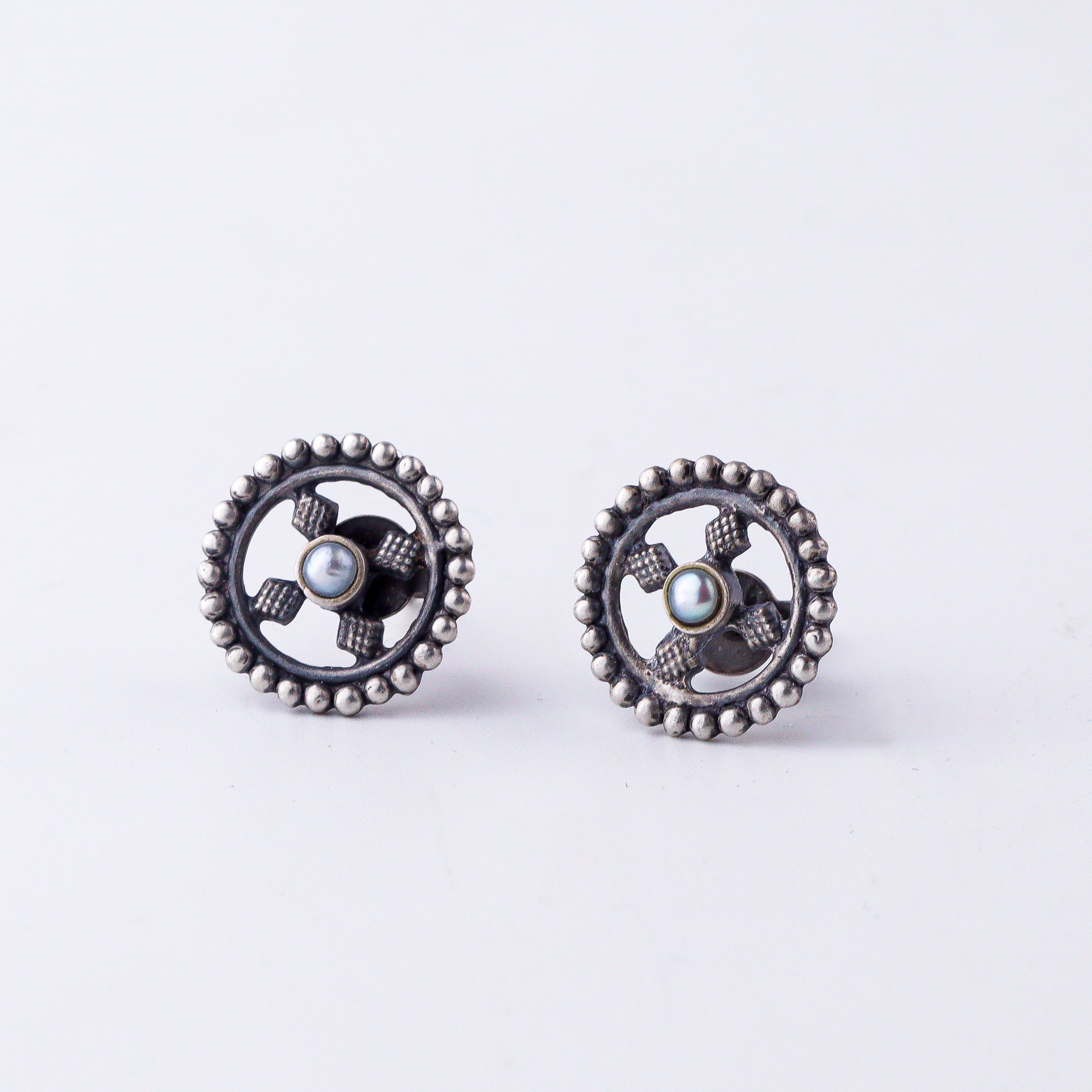 Silver dotted diamond studs in 92.5 sterling silver