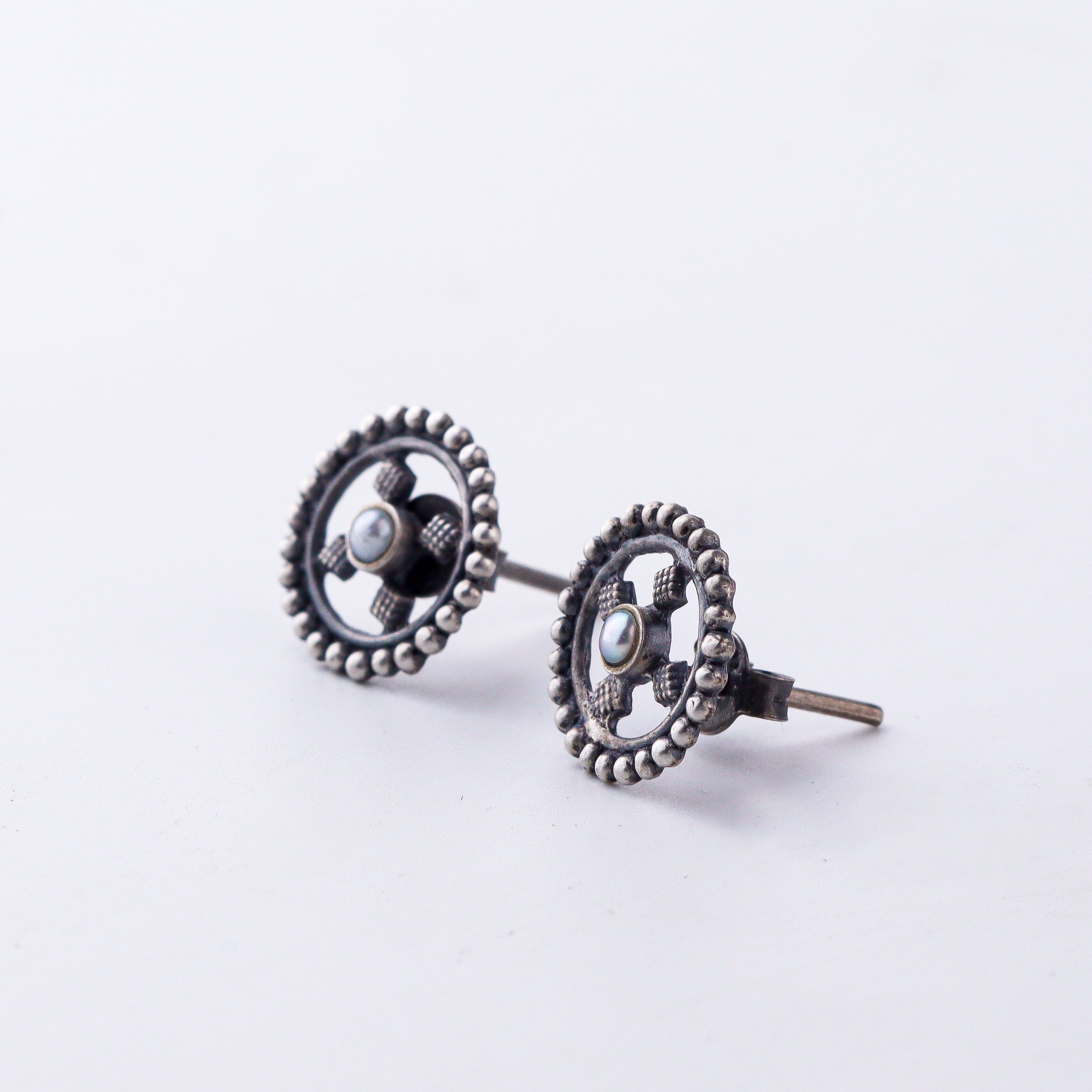 Handcrafted silver diamond pattern studs polished finish