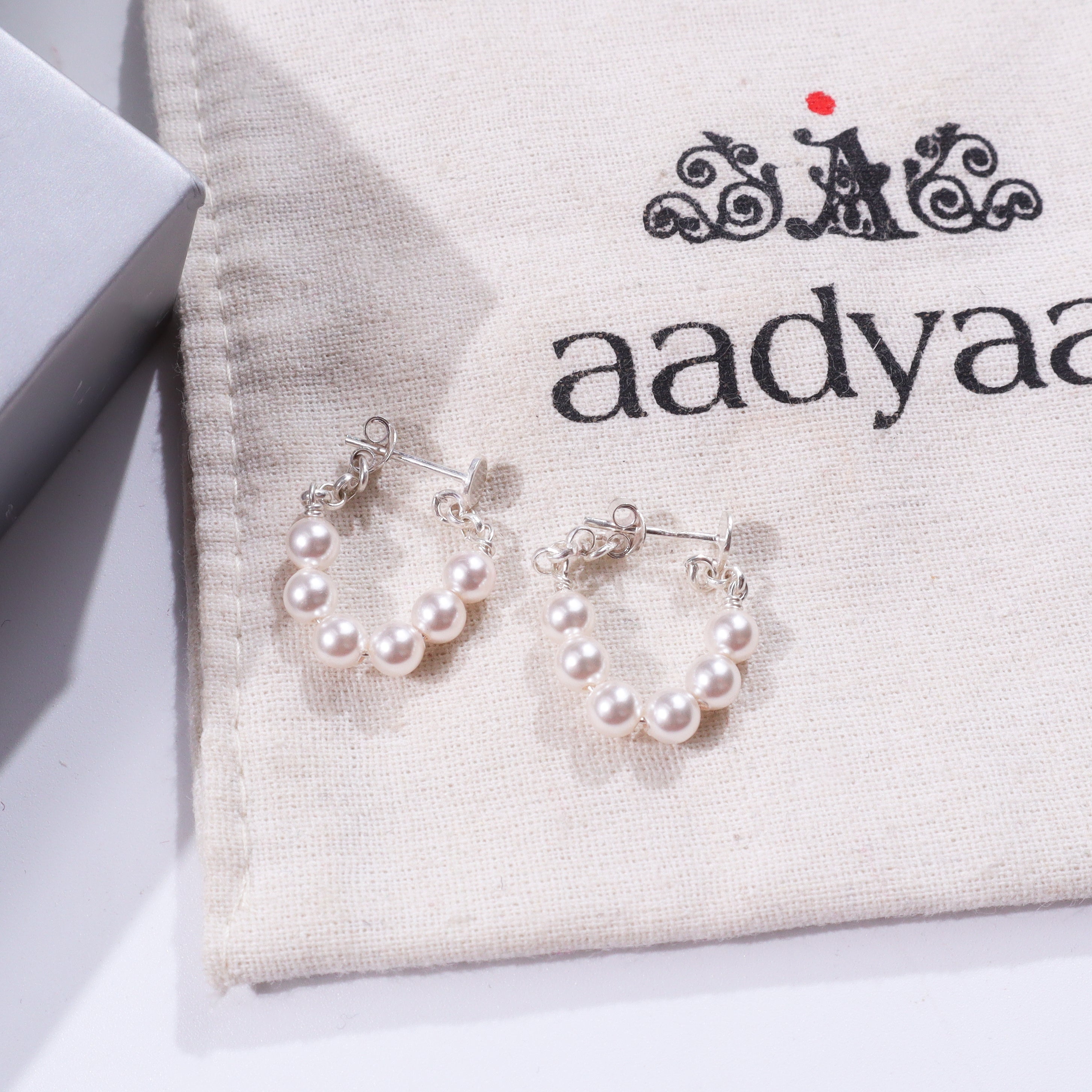 Elegant pearl earrings with silver hooks