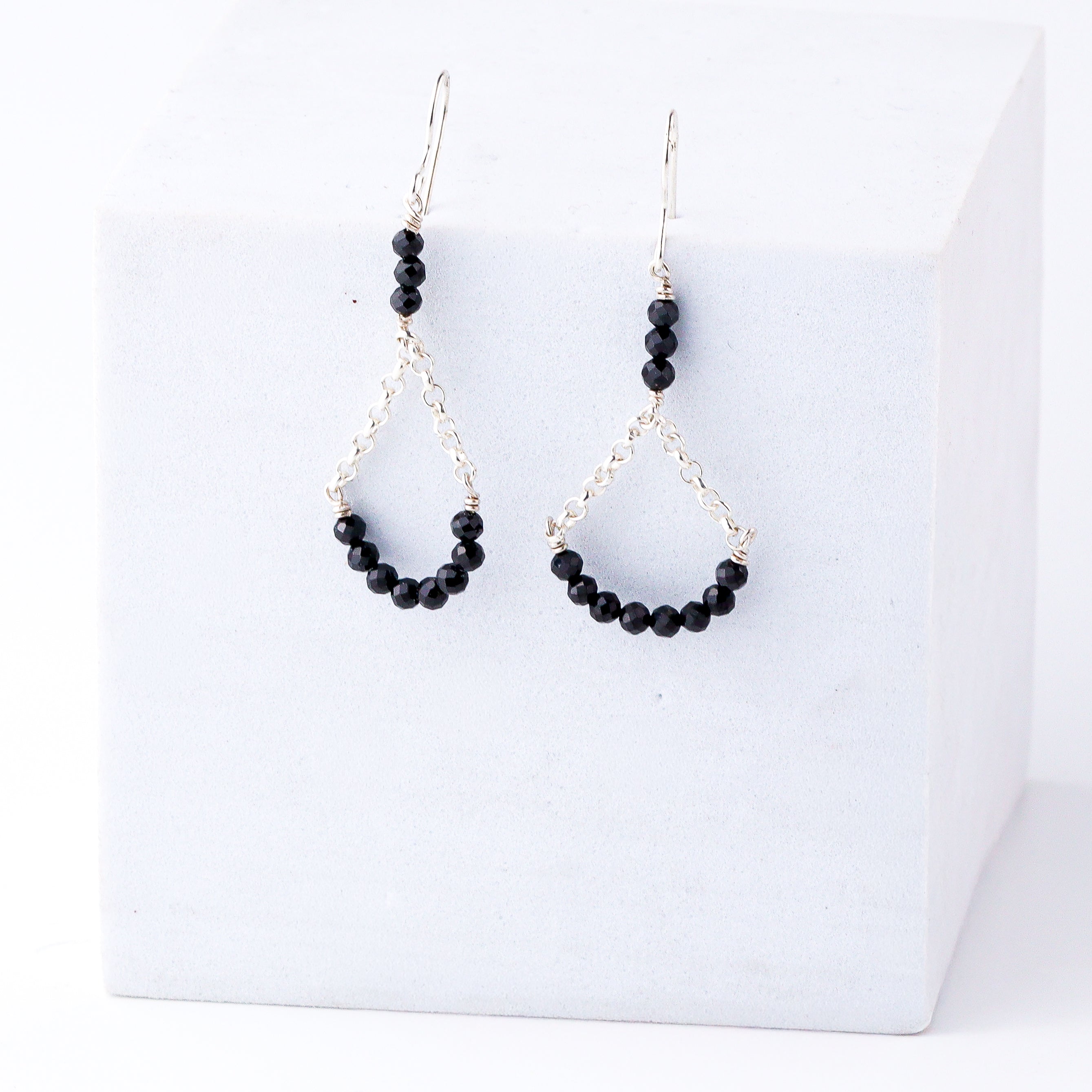 wear silver black spinel earrings for everyday look