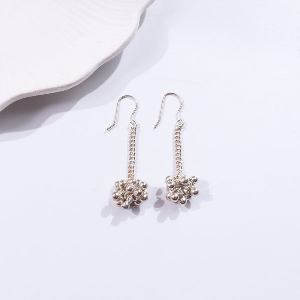 Silver earrings with chain and bead design
