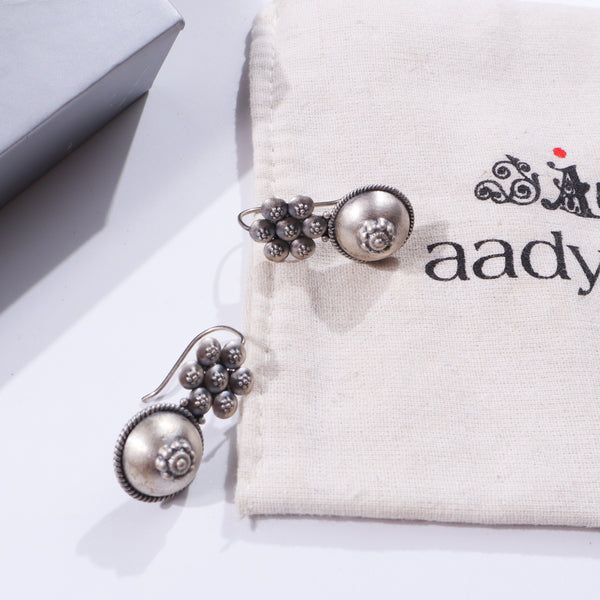 Silver floral earrings with beaded design
