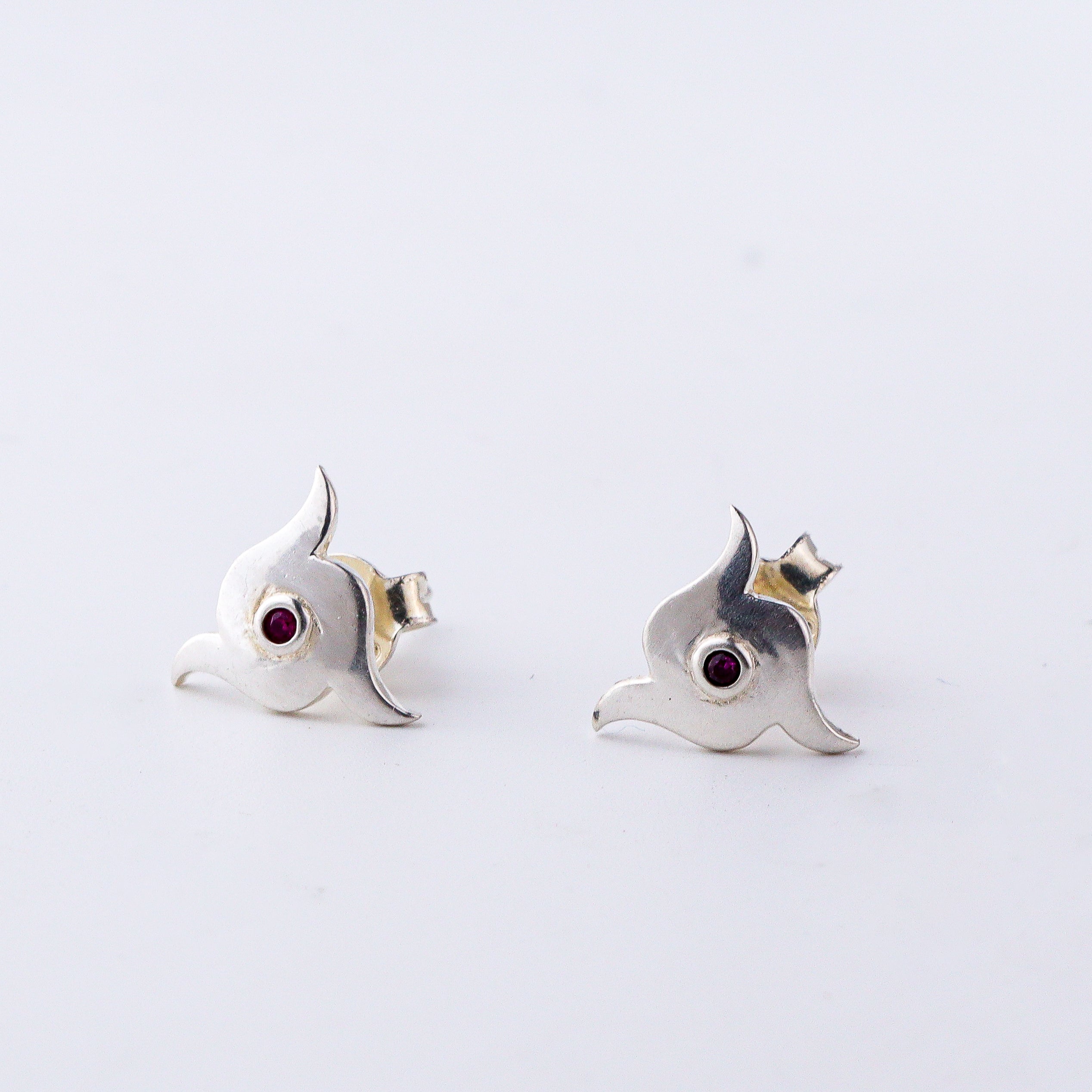Silver Nakshatra studs in 92.5 sterling silver with ruby-toned accent
