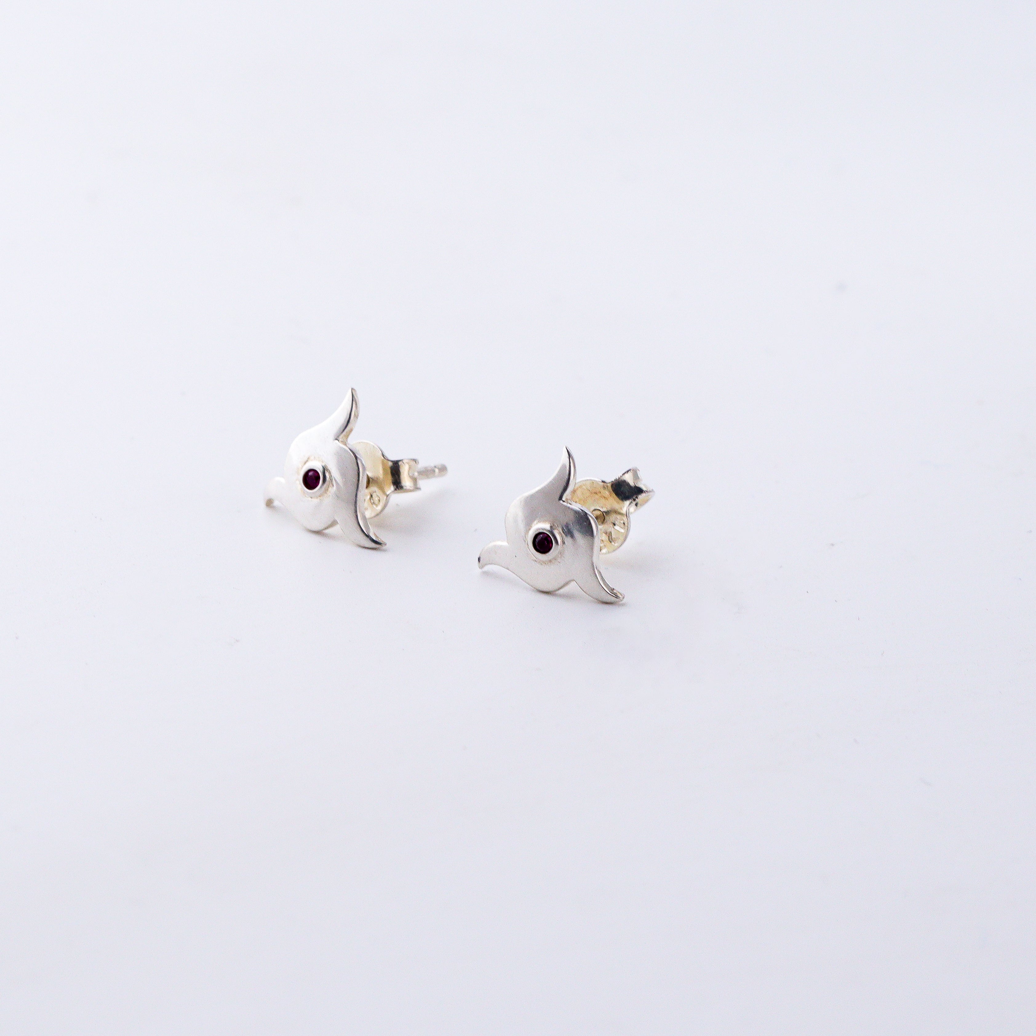 Handcrafted silver Nakshatra studs polished finish