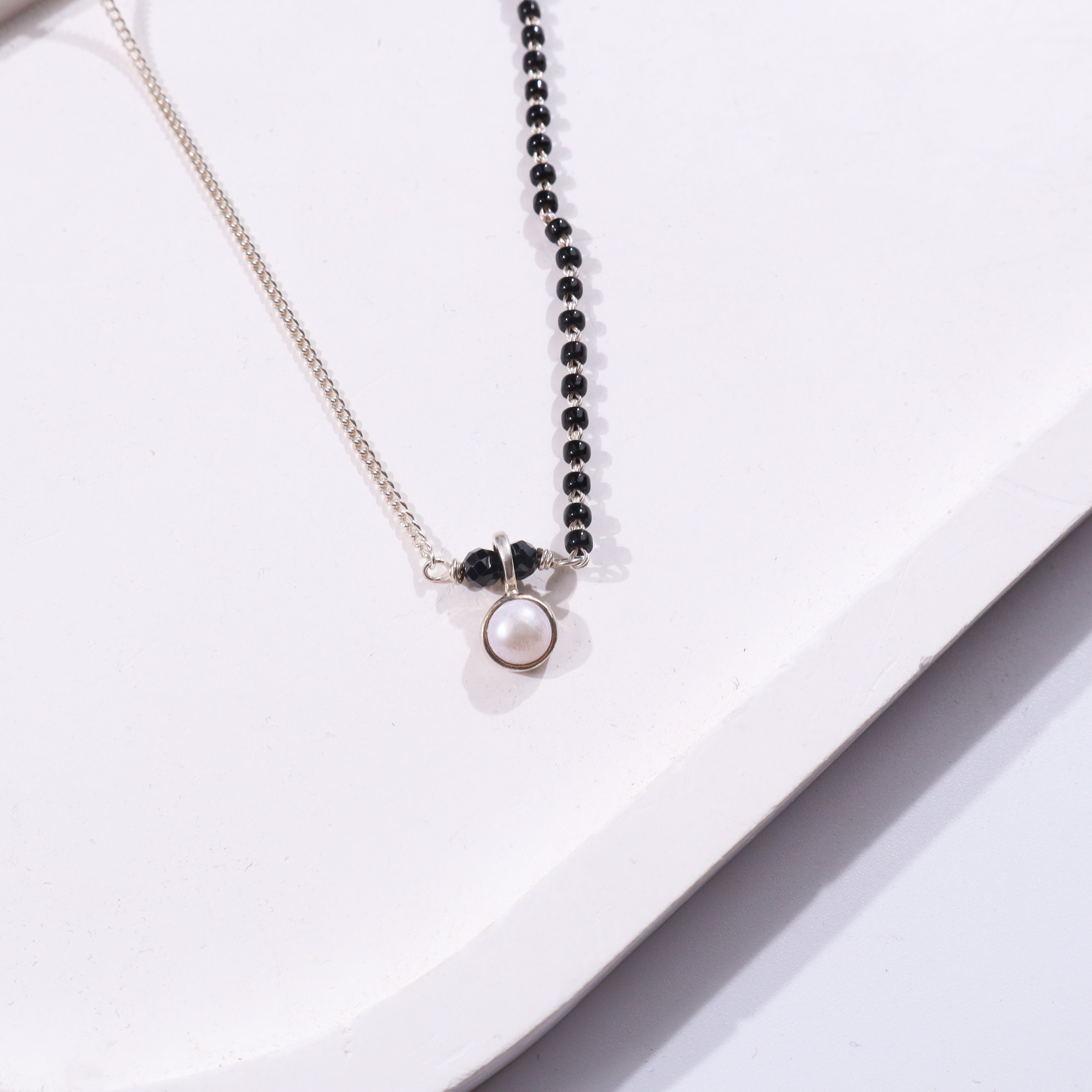 Half & Half Pearl Drop Mangalsutra necklace with black and silver beads