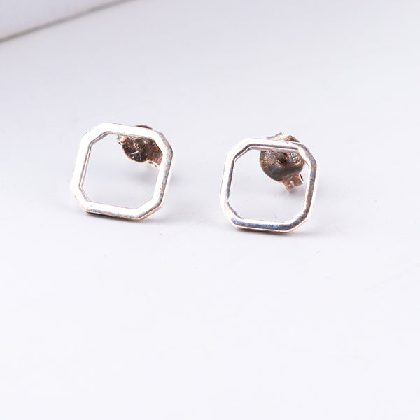 Handcrafted tiny squircle silver earrings polished finish