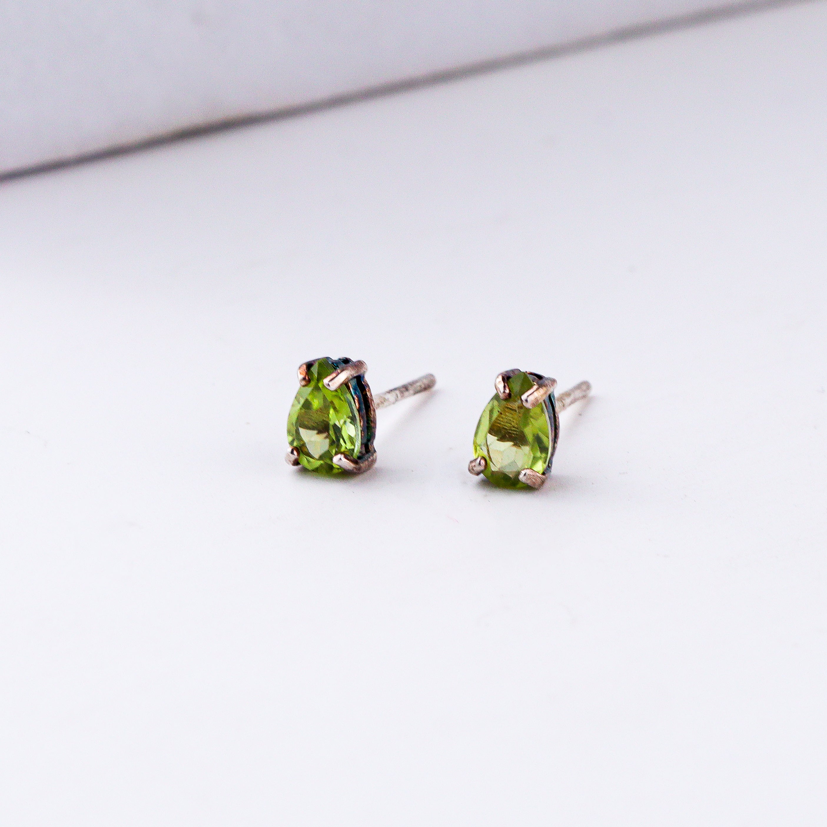 Handcrafted silver peridot studs polished finish