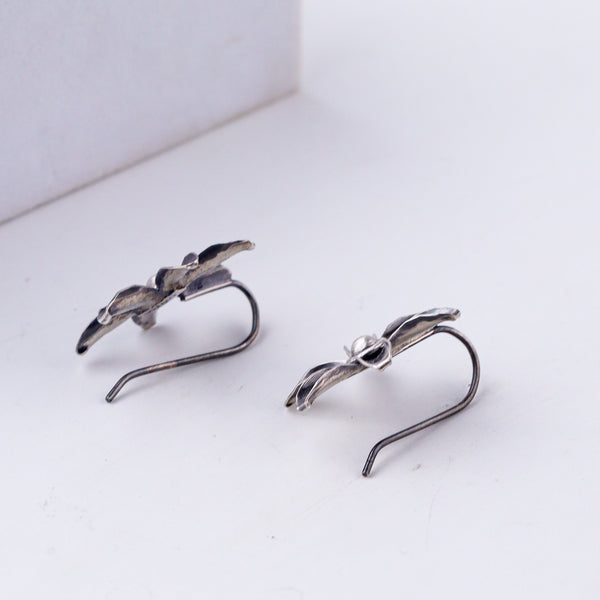 styling floral silver earrings with ethnic outfit