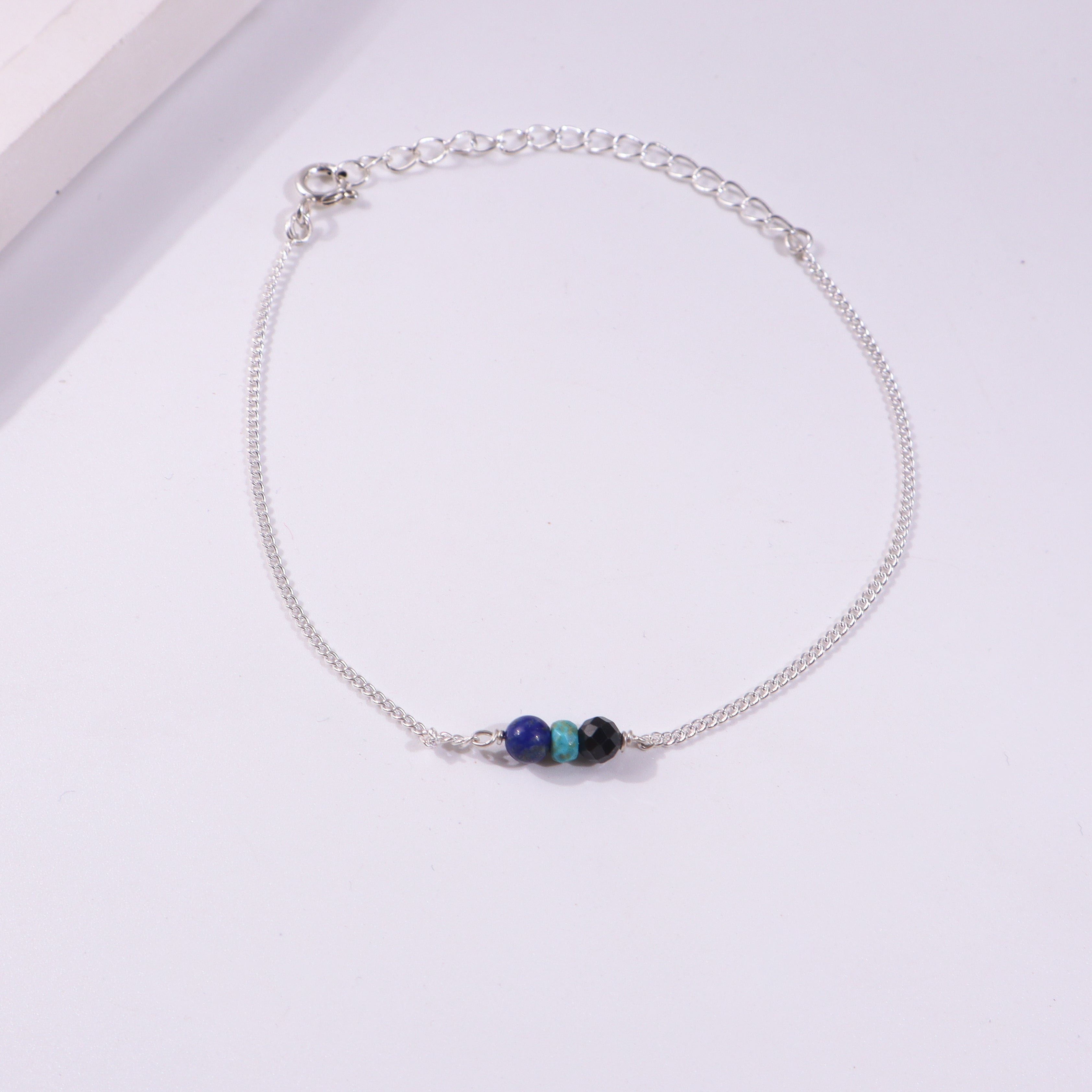 Silver chain bracelet with colorful beads