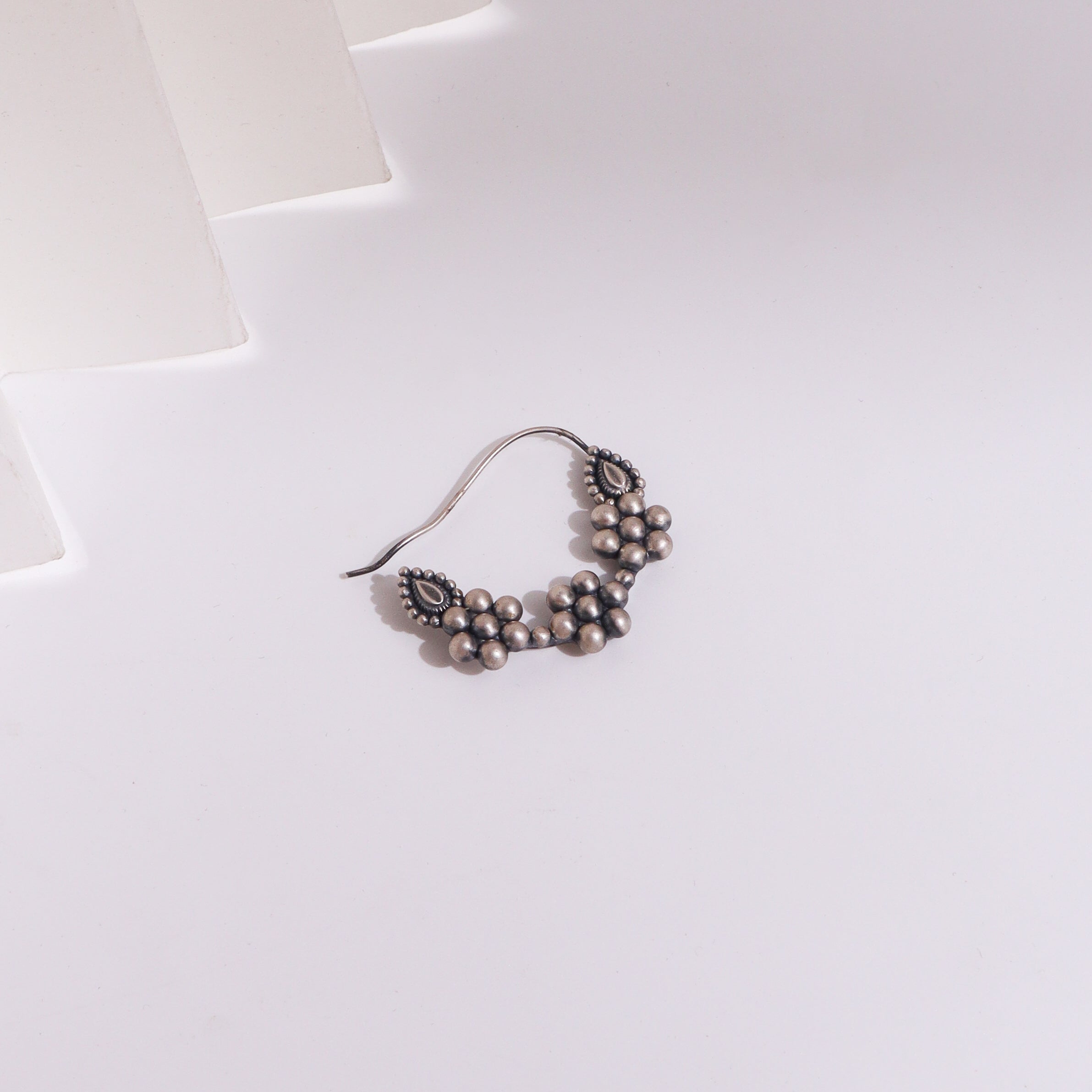 Silver jewelry earring with traditional design