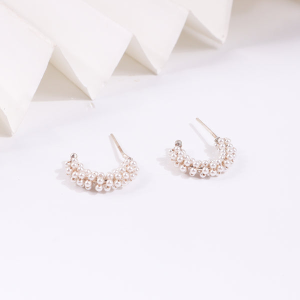 Pearl hoop earrings with gold accents