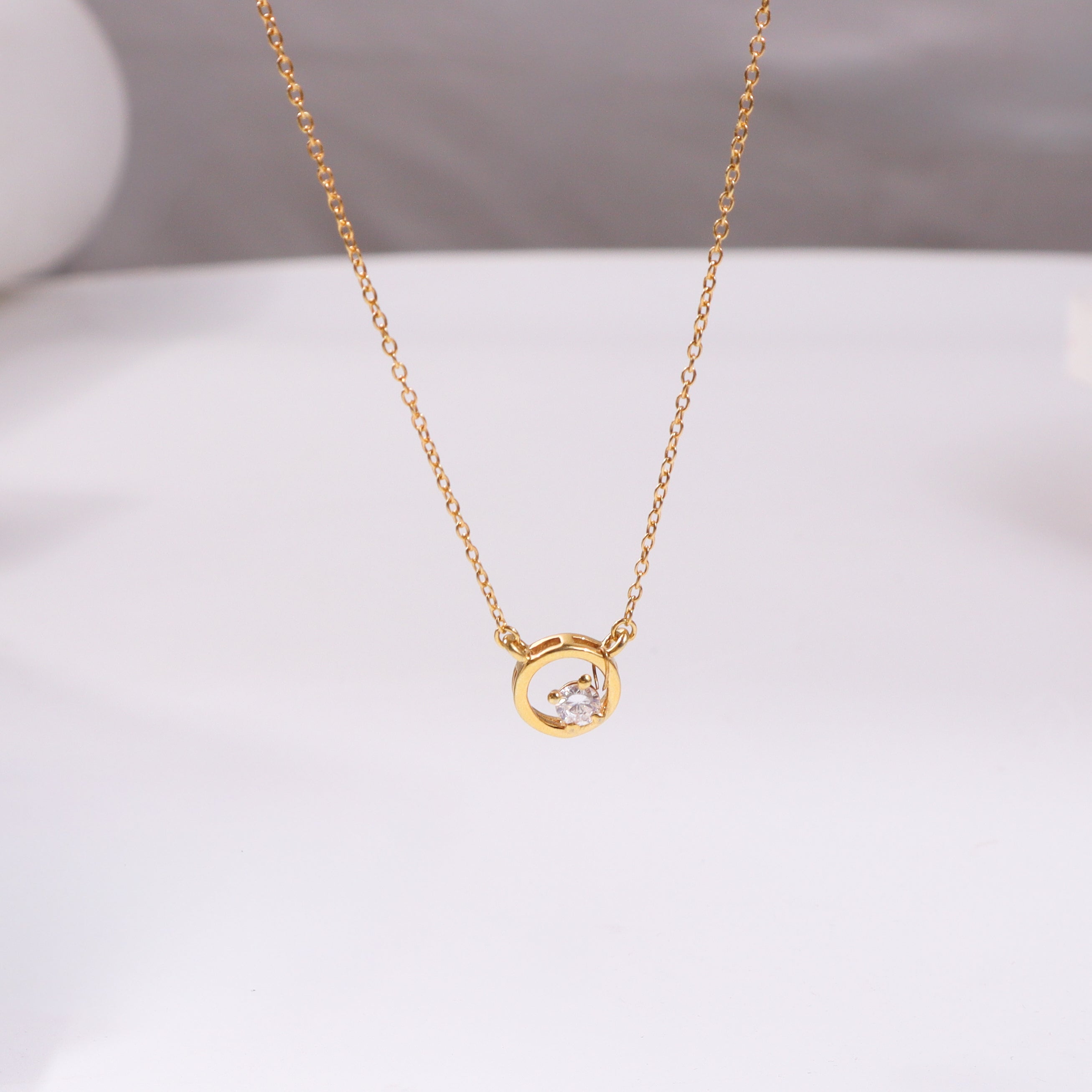 Gold chain with CZ pendant
