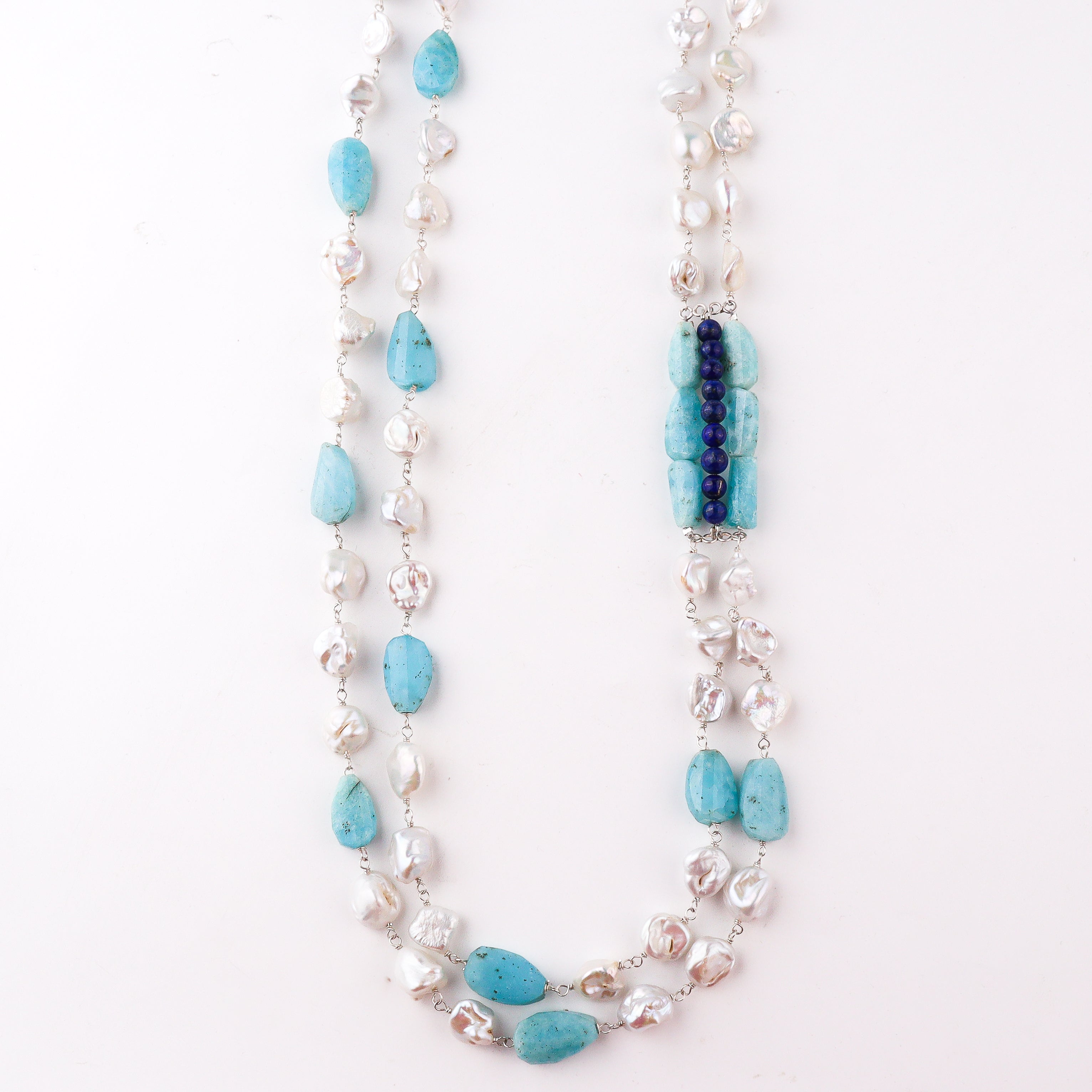 Handcrafted luxe necklace with lapis larimar and baroque pearls polished finish