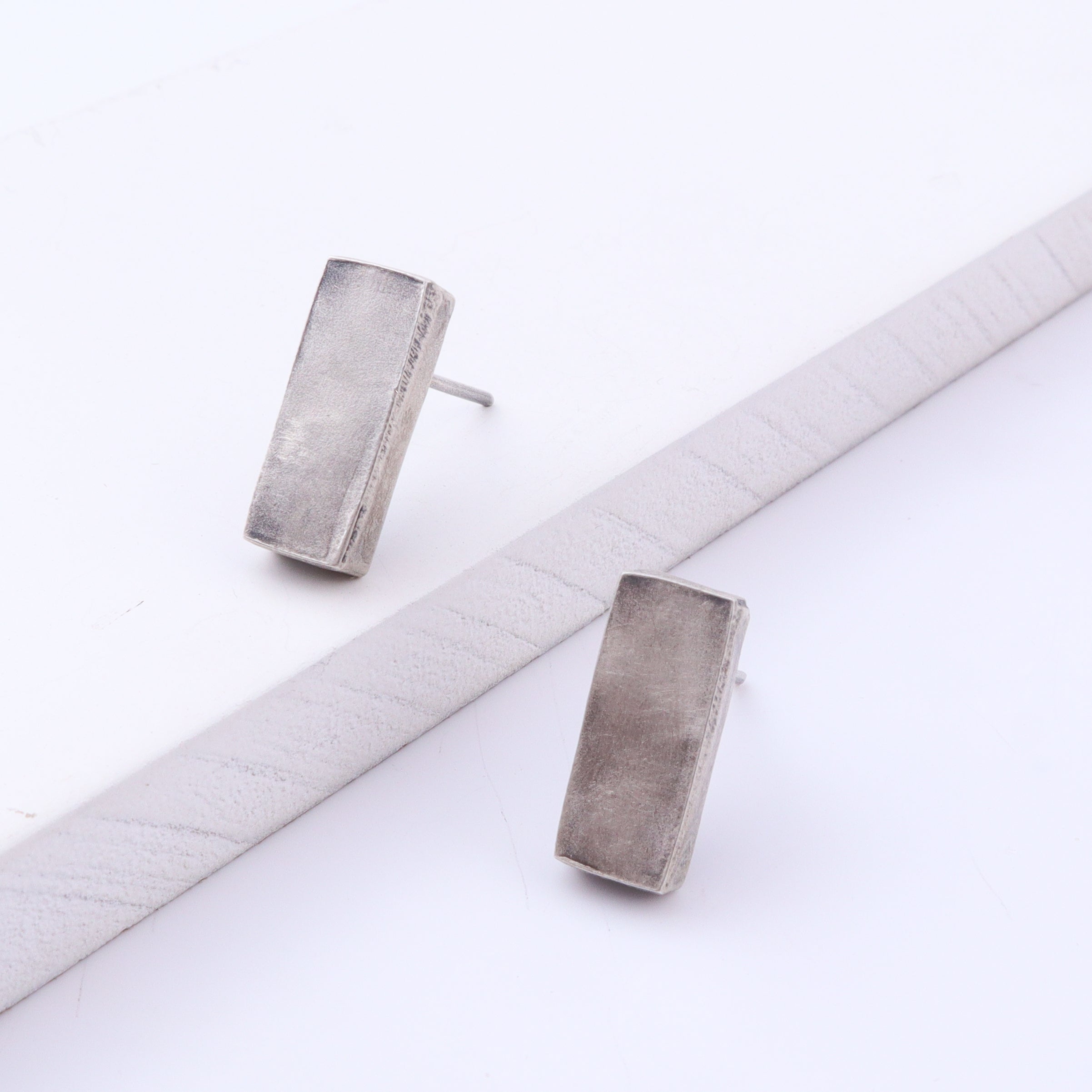 Silver rectangular earrings with backing