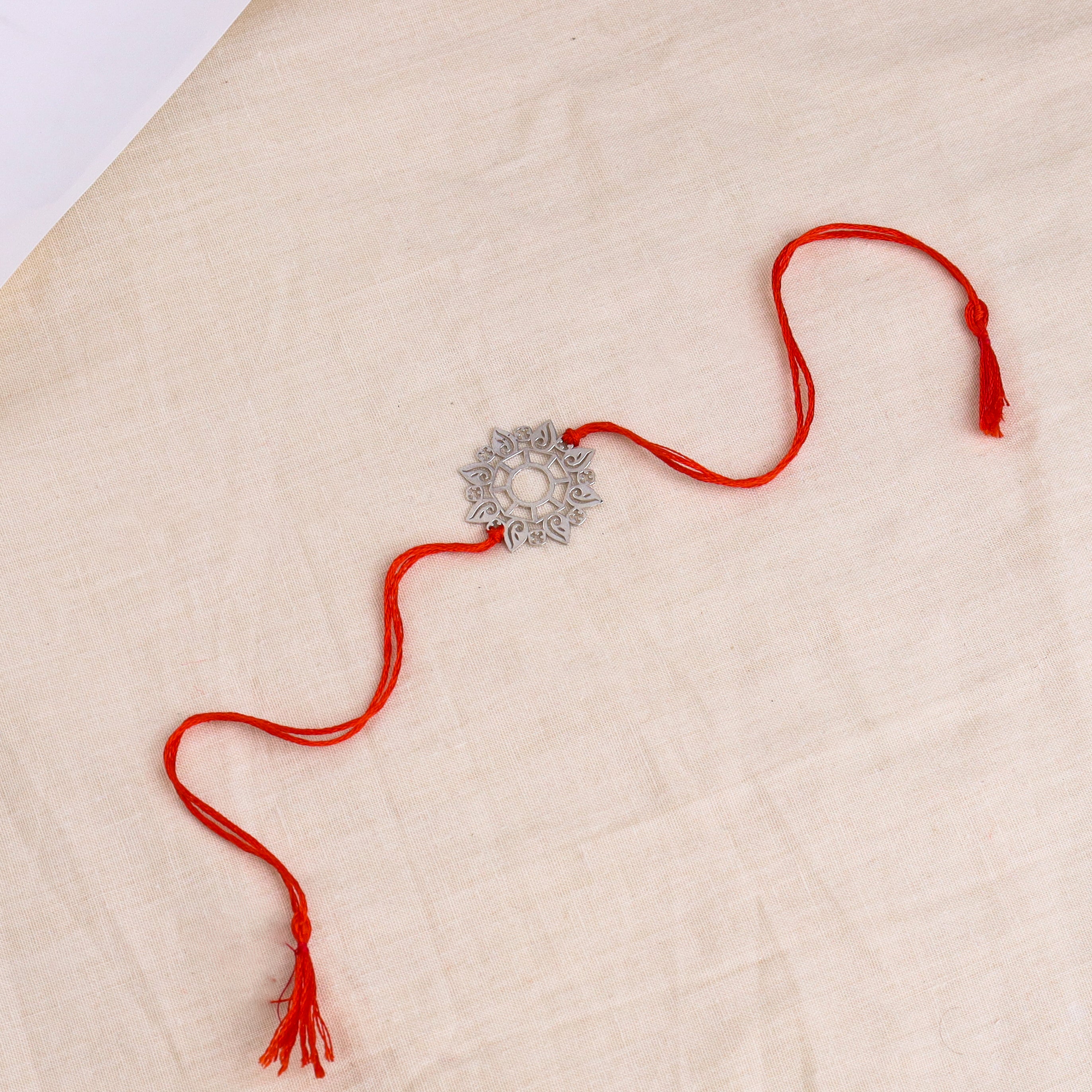 Silver Laser Cut Abstract Rakhi