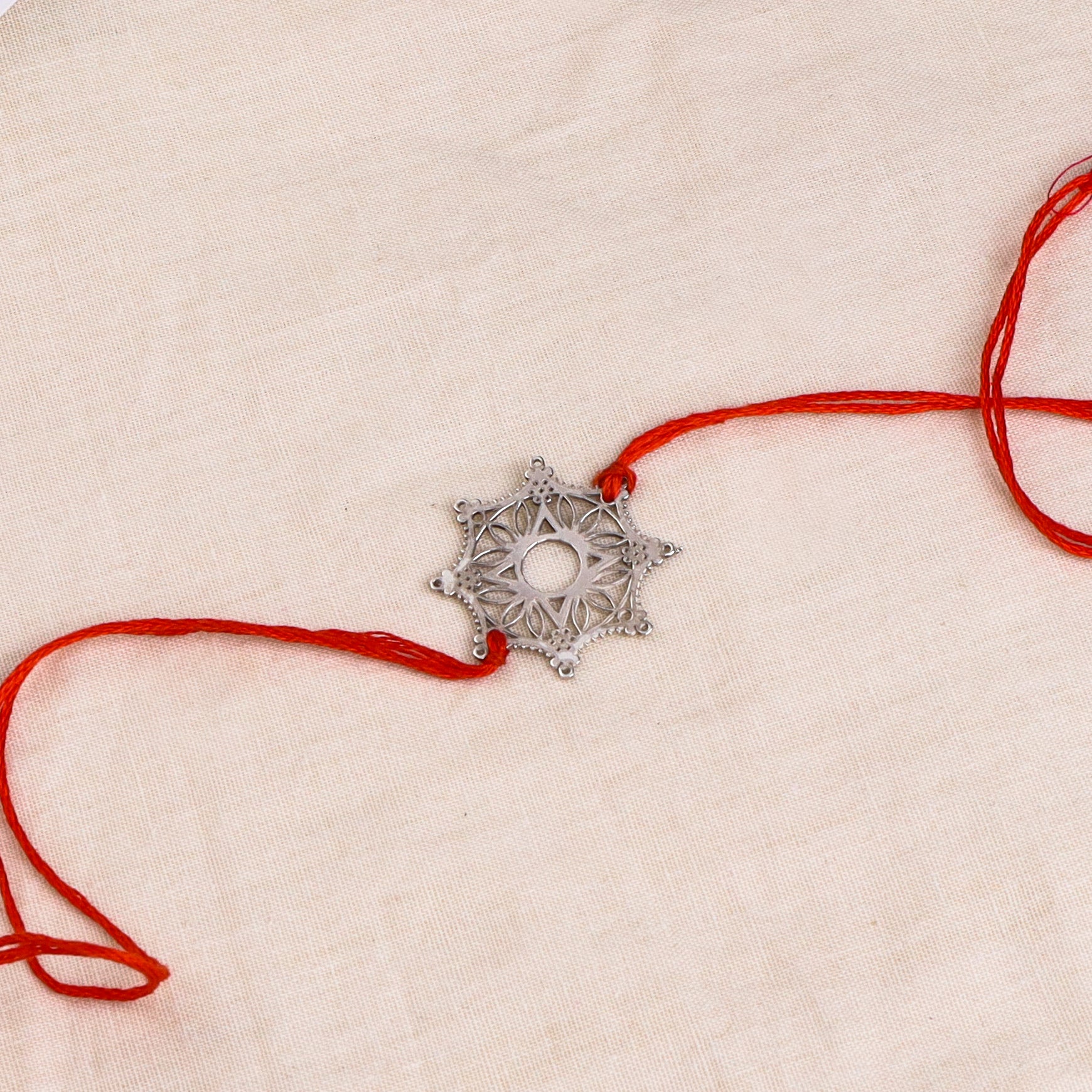 Silver Laser Cut Snowflake Rakhi