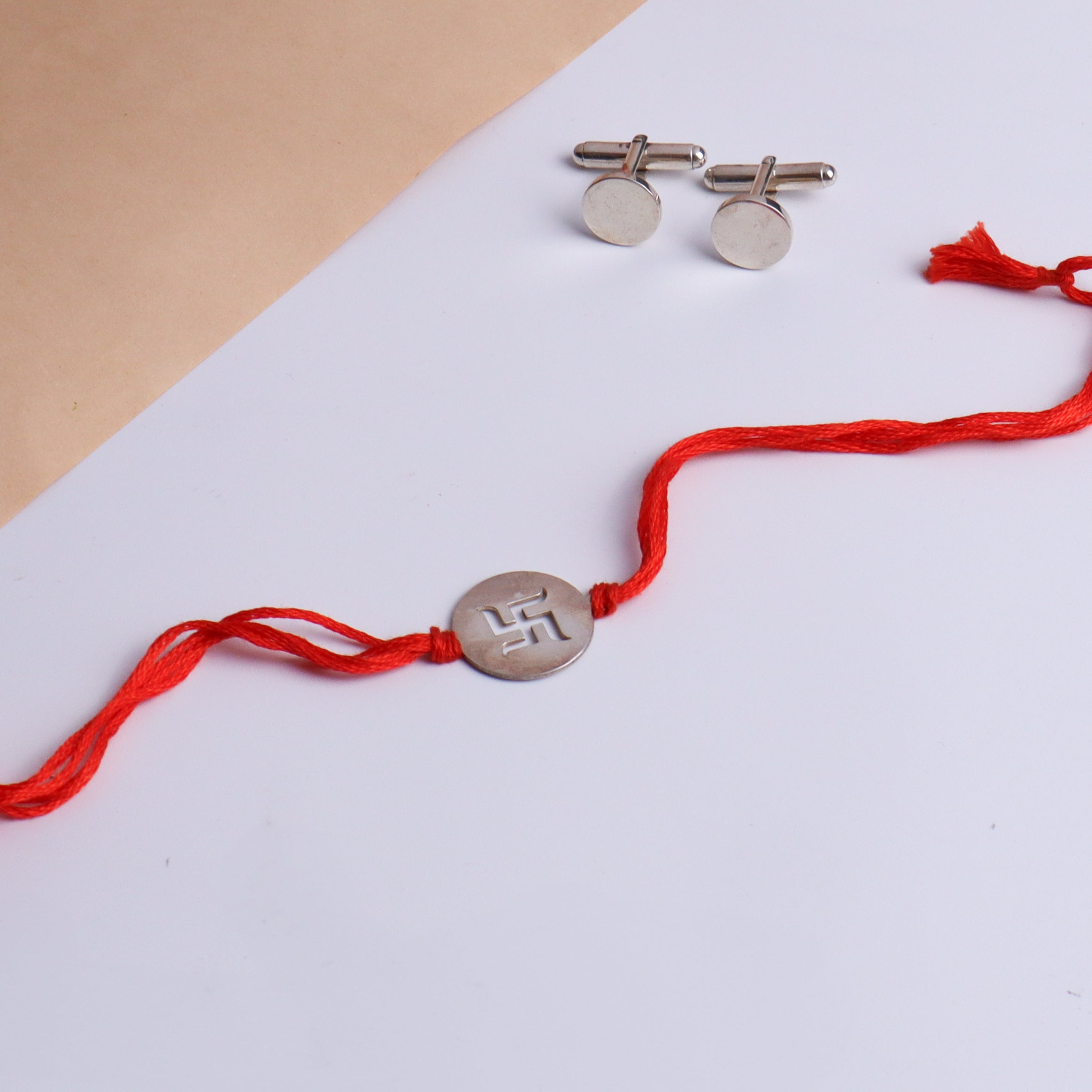 Silver Gift Set : Swastik Rakhi and Round Cufflink