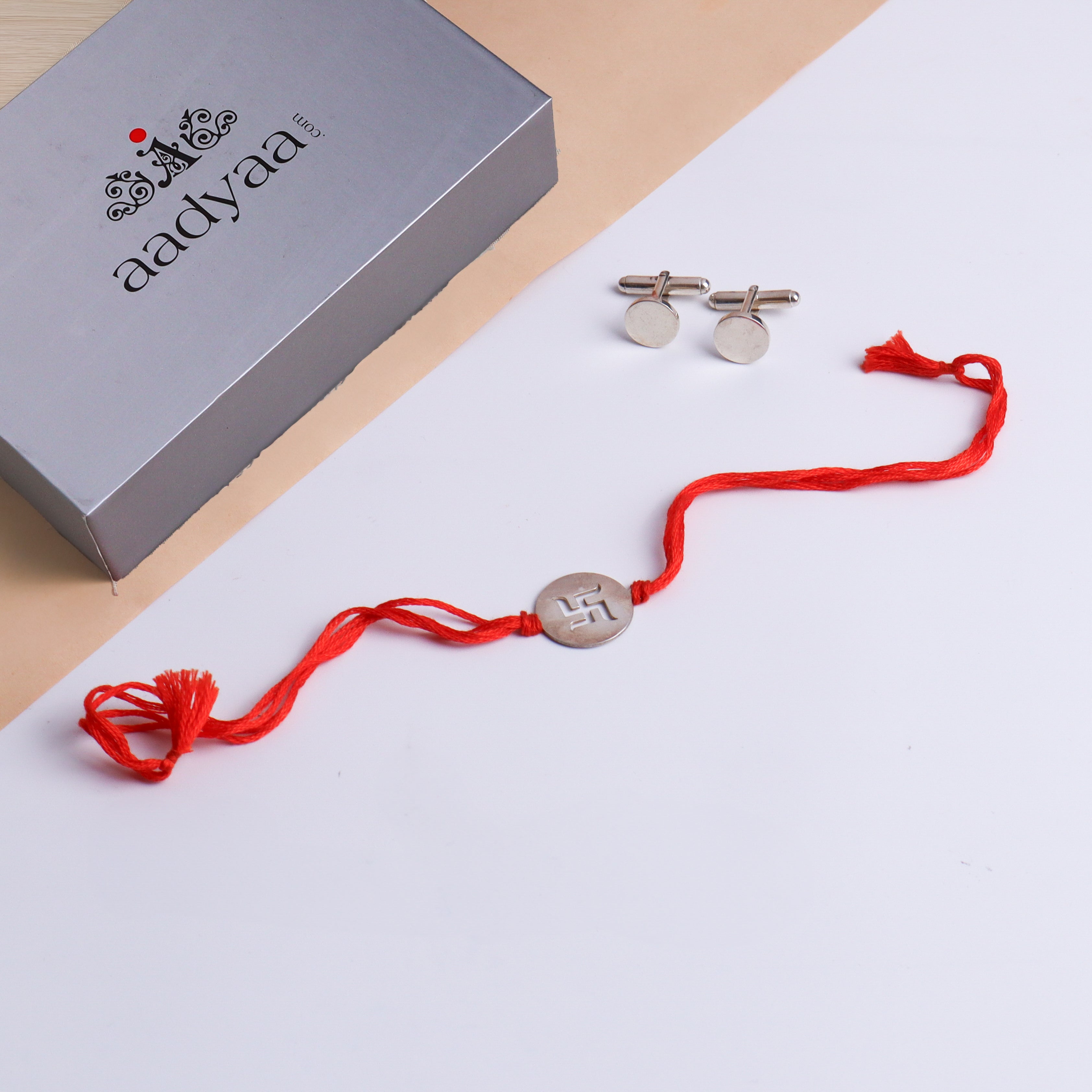 Silver Gift Set : Swastik Rakhi and Round Cufflink