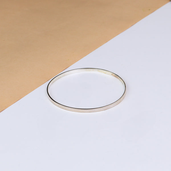 Silver linear textured bangle