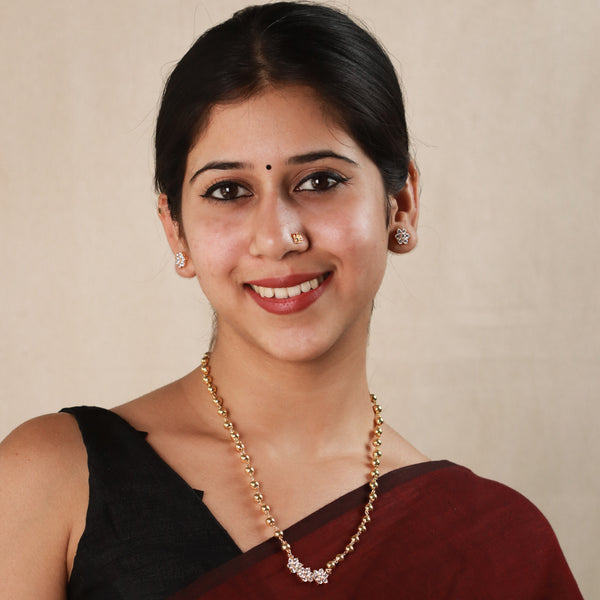 Stone-Studded Flower Motif Set with Silver Beads | Gold-Plated earrings and necklace