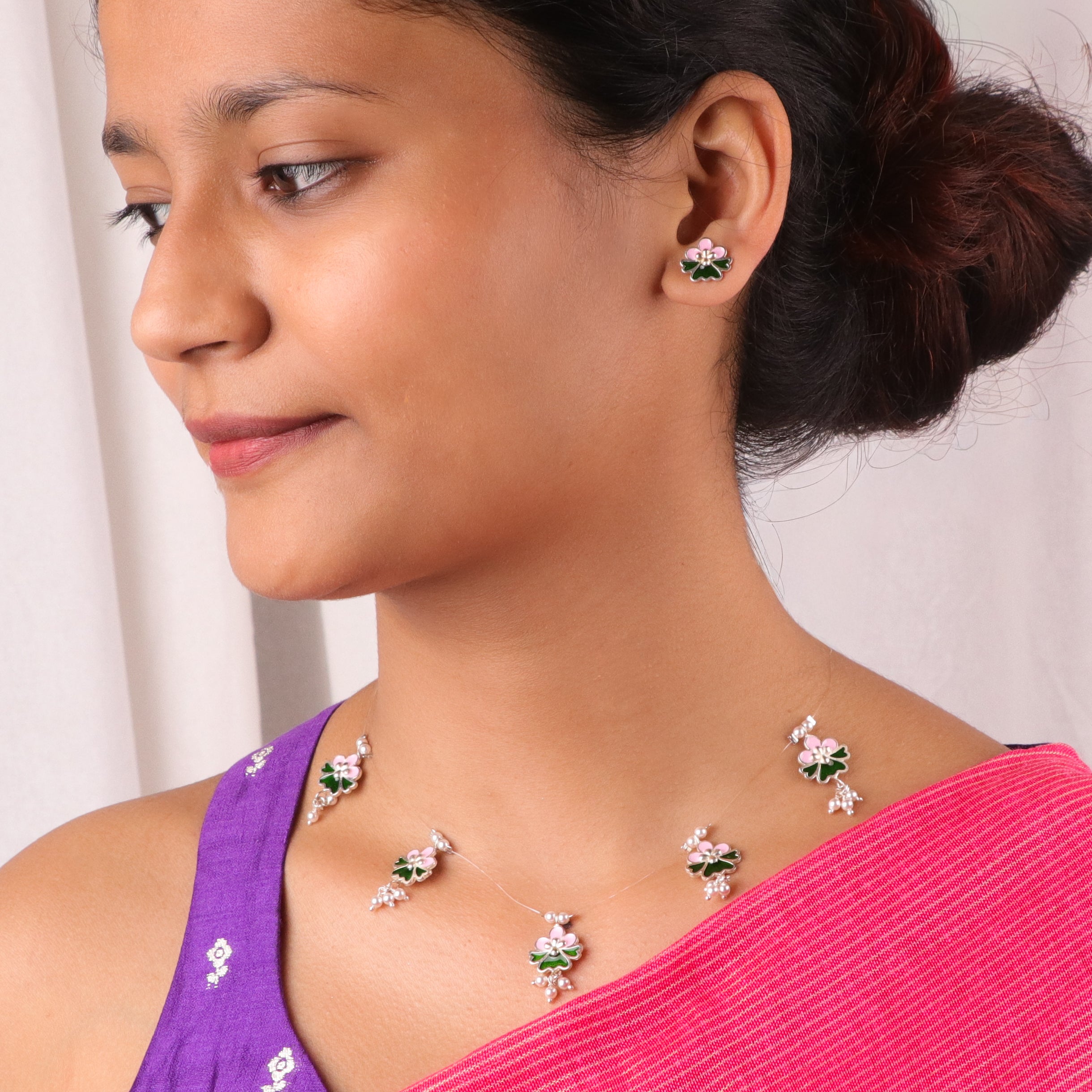Meena charm set with invisible thread